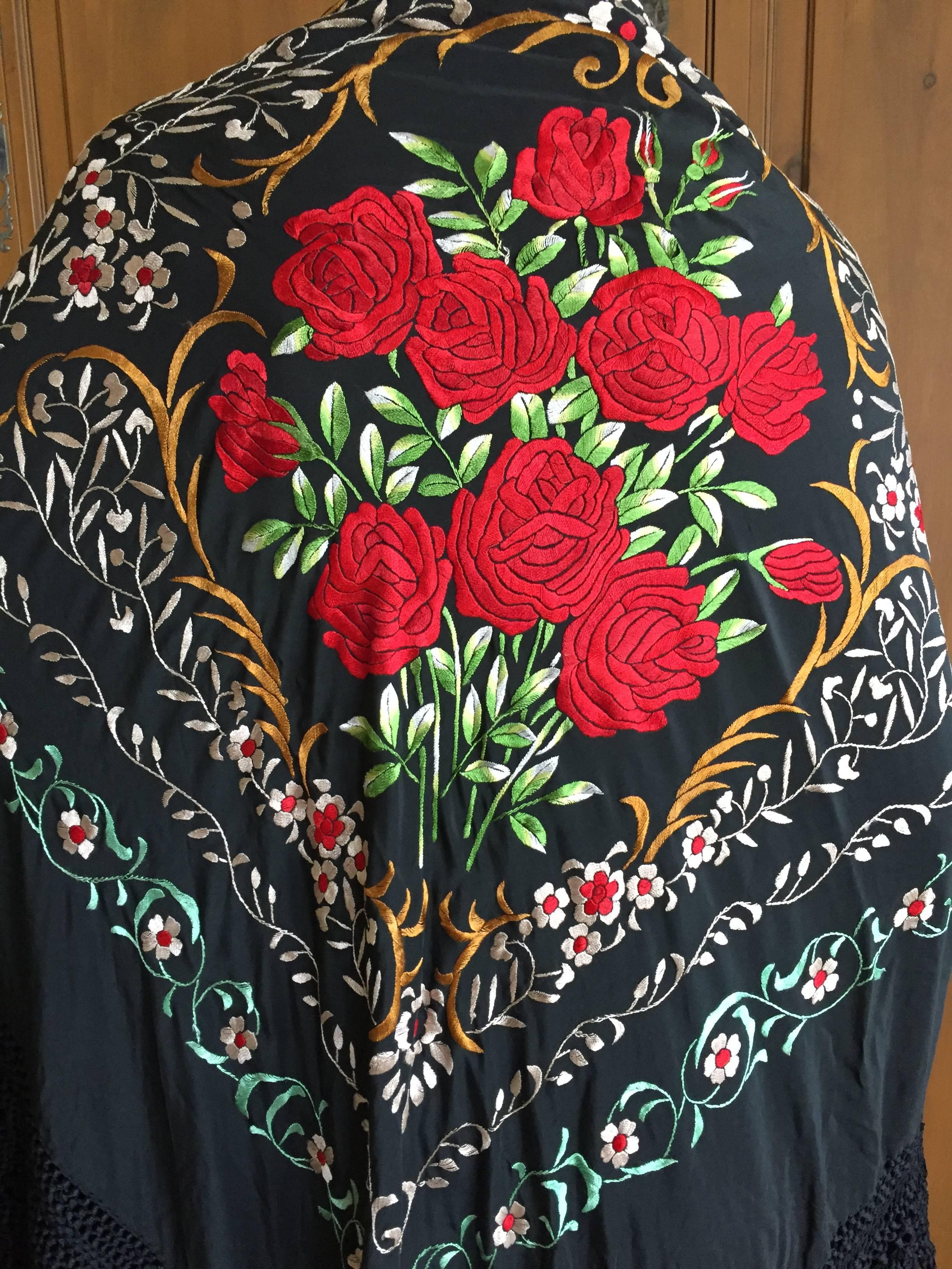 Beautiful large black antique piano shawl embroidered with beautiful red roses with long fringe.
