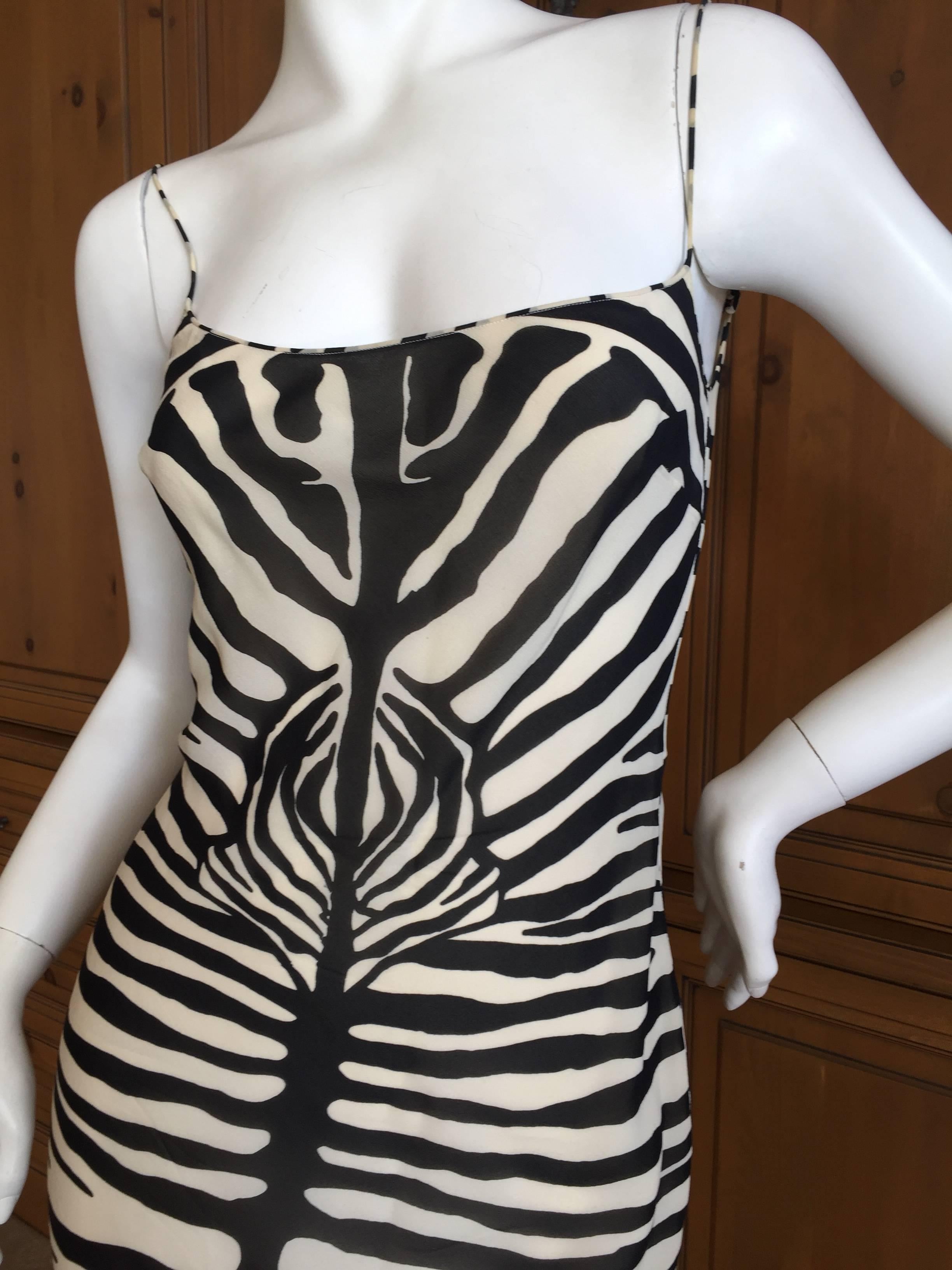 Beautiful bias cut silk zebra pattern dress from John Galliano, circa 1990's.
So simple and sweet.
Size 36
Bust 36