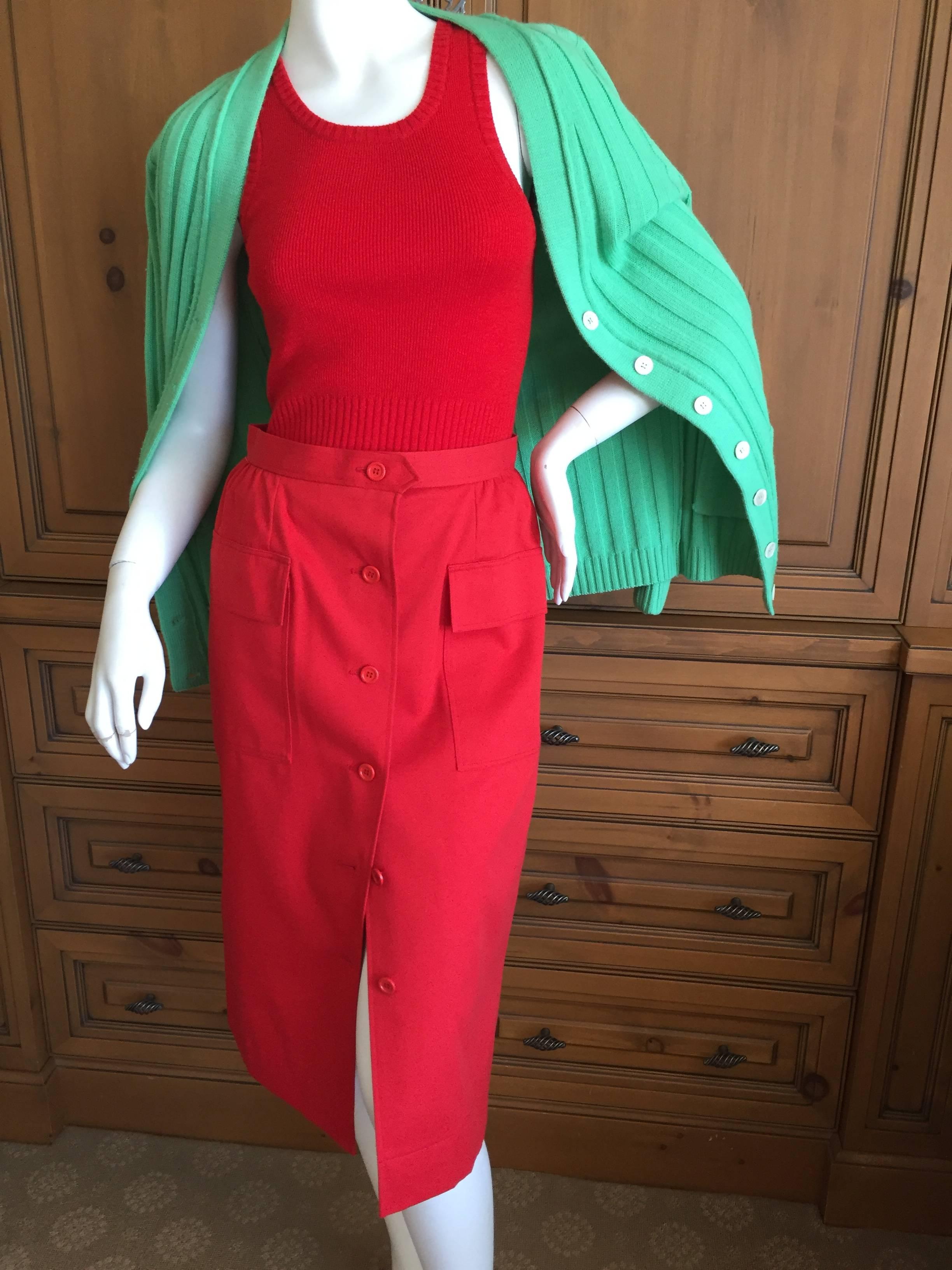 Yves Saint Laurent Rive Gauche 1970's  3 piece suit consisting of a cotton skirt, a wool tank top and a wool sweater.
This is the way it was presented by YSL and purchased by the original owner.
Tank ;
Bust 36