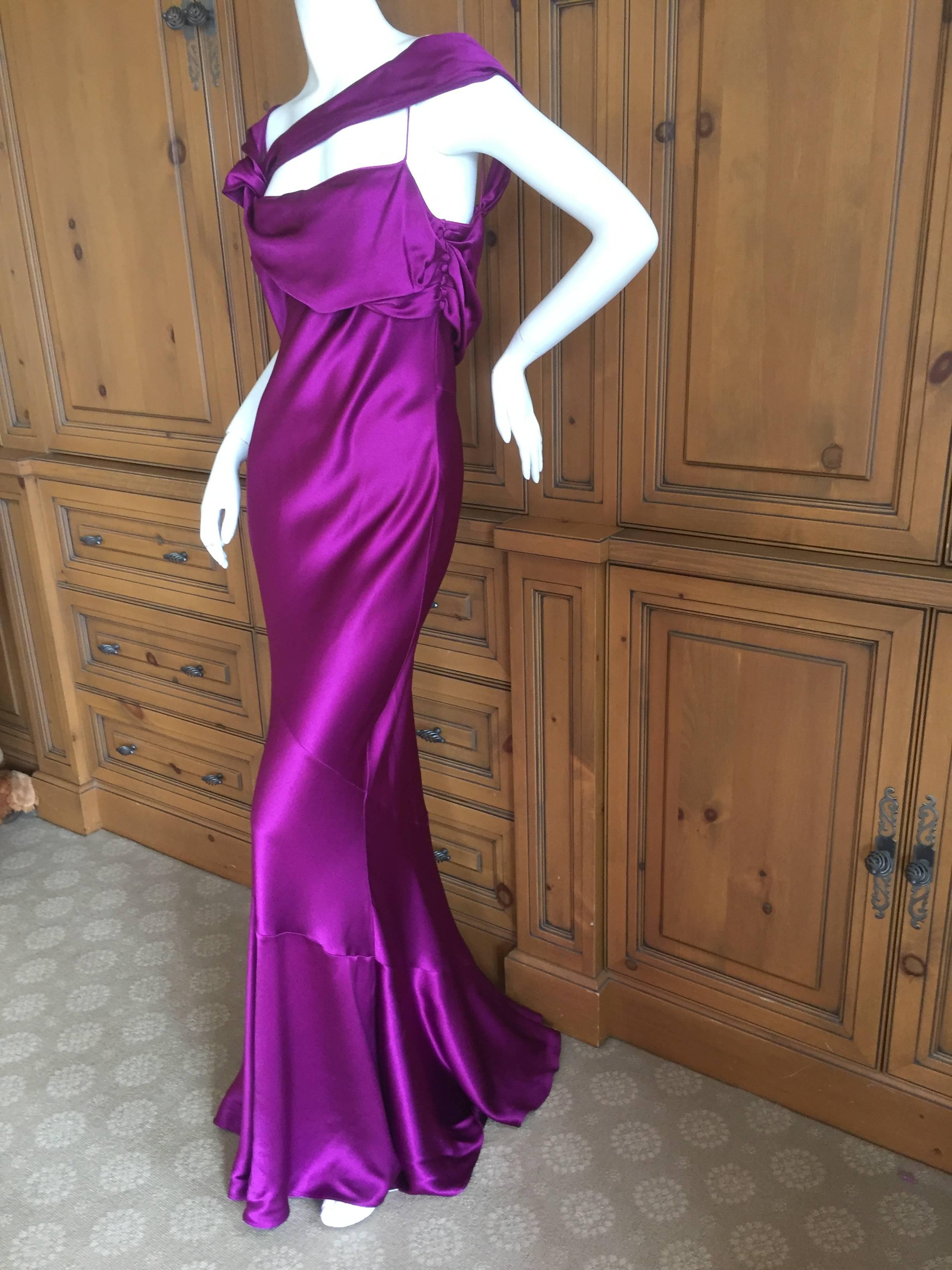 Sensation purple charmeuse evening dress by John Galliano.
This is sensational, the photos don't do it justice.
This is very long, to pool along the floor, with a train.
SIze 44
Bust 40