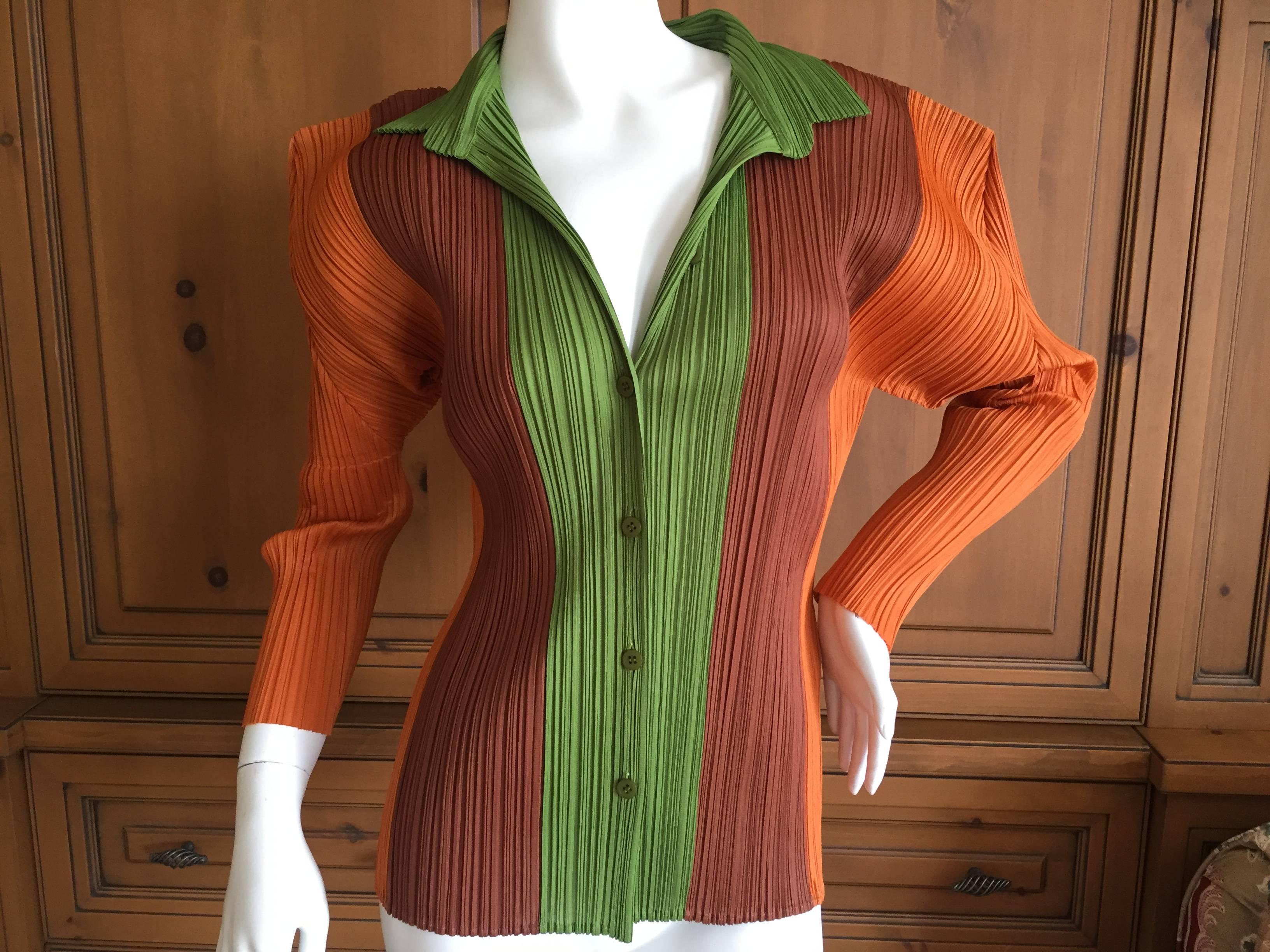 Issey Miyake Pleats Please Rare Vintage Color Block Jacket.
Button front, size 5.
There is a lot of stretch in the pleated fabric.
Bust 38