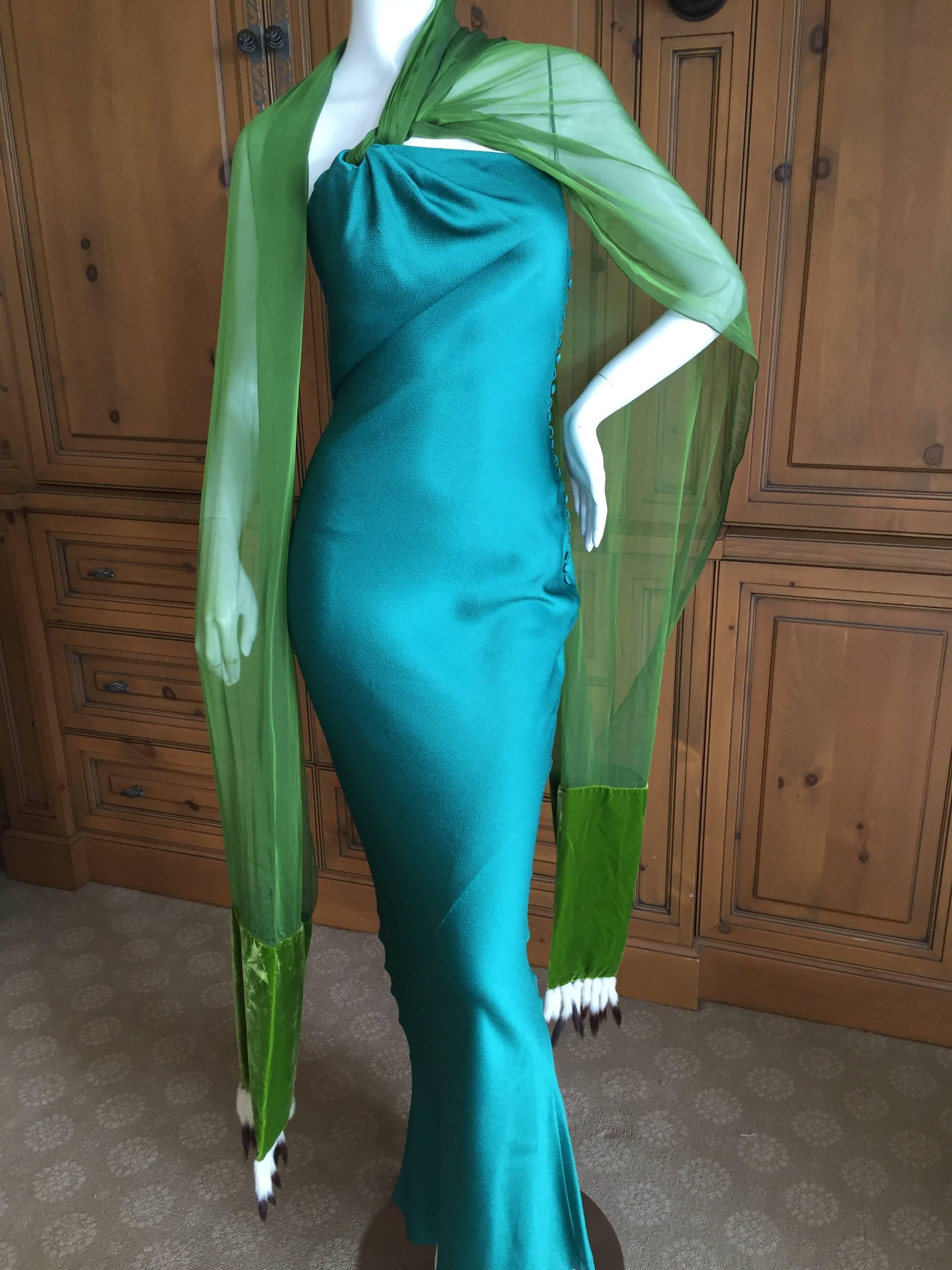 Beautiful textured silk bias cut dress from John Galliano for Christian Dior circa 1998.
Attached at the shoulder are two wide chiffon scarves trimmed at the ends with ermine tails.
I'm not certain how Galliano originally styled this, so I tried