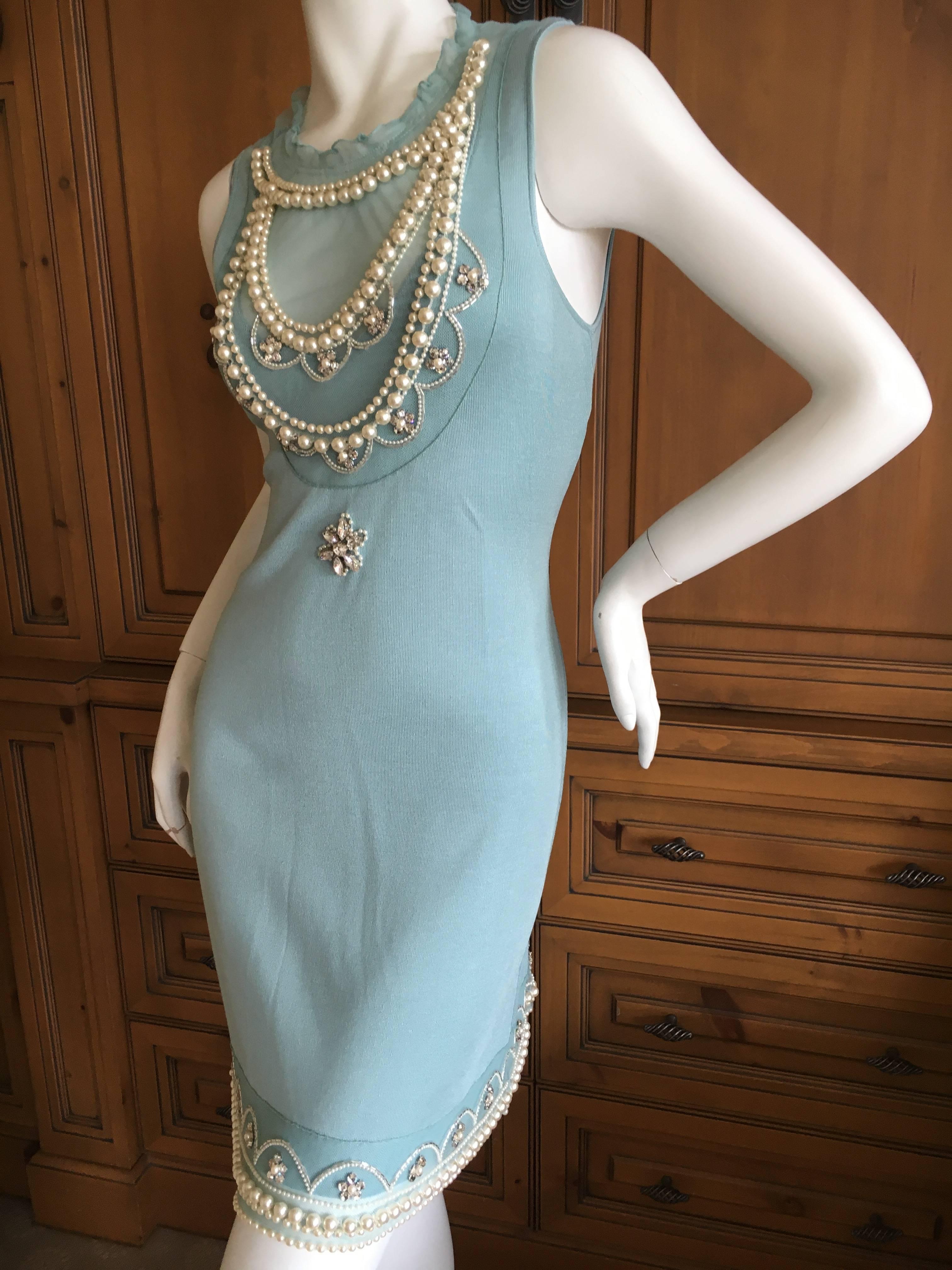 Simply amazing silk shift dress with glass pearl and Swarovski crystal trompe-l'œil jewels sewn on to a net overlay by Lesage.
This is so much prettier in person, it really sparkles a lot.
I believe this is by John Galliano for Dior.
Size 36 French