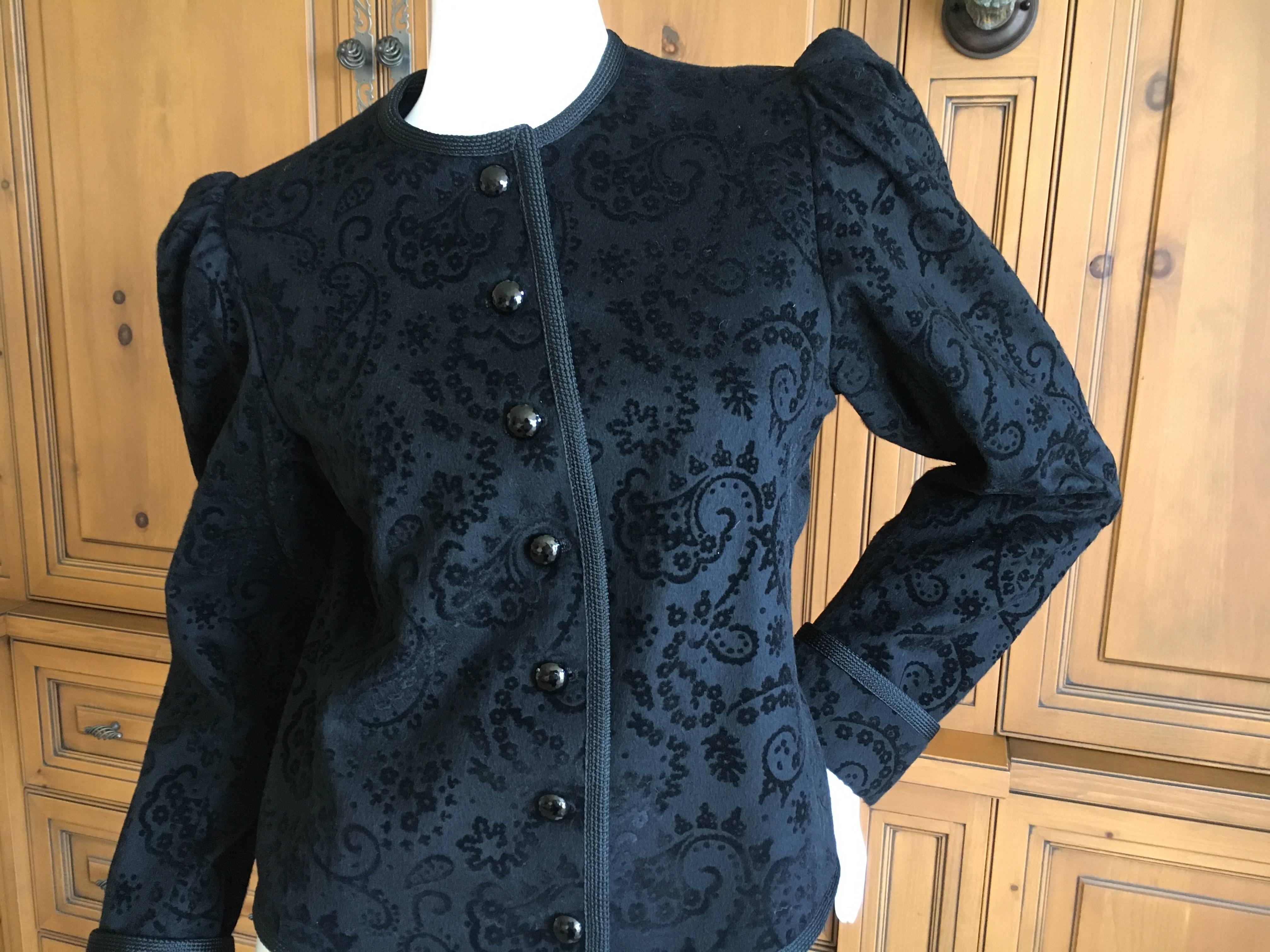 Saint Laurent Rive Gauche 1980 Black Jacket with Jet Buttons and Cord Trim.
The fabric feels like cashmere or very fine woo, with a velvet pattern, very pretty, but hard to capture in a photograph.
Size 40
Bust 38