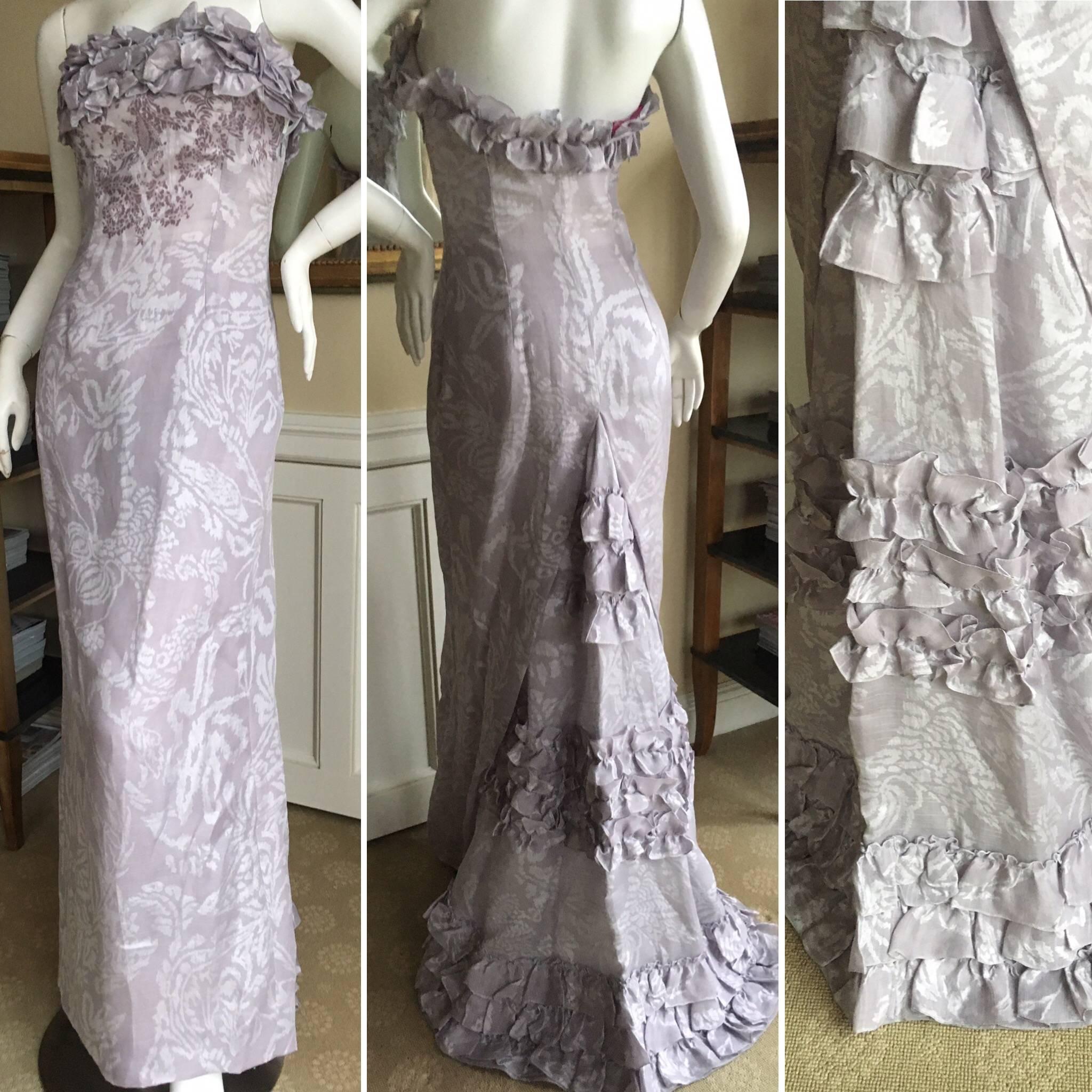 Christian Lacroix  Ruffled Gray Silk Jacquard Strapless Evening Dress with Train.
This is so exquisite, the photos don't capture it's charm.
Size 38
Bust 36"
Waist 27"
Hips 48"
Length 52"
Excellent condition