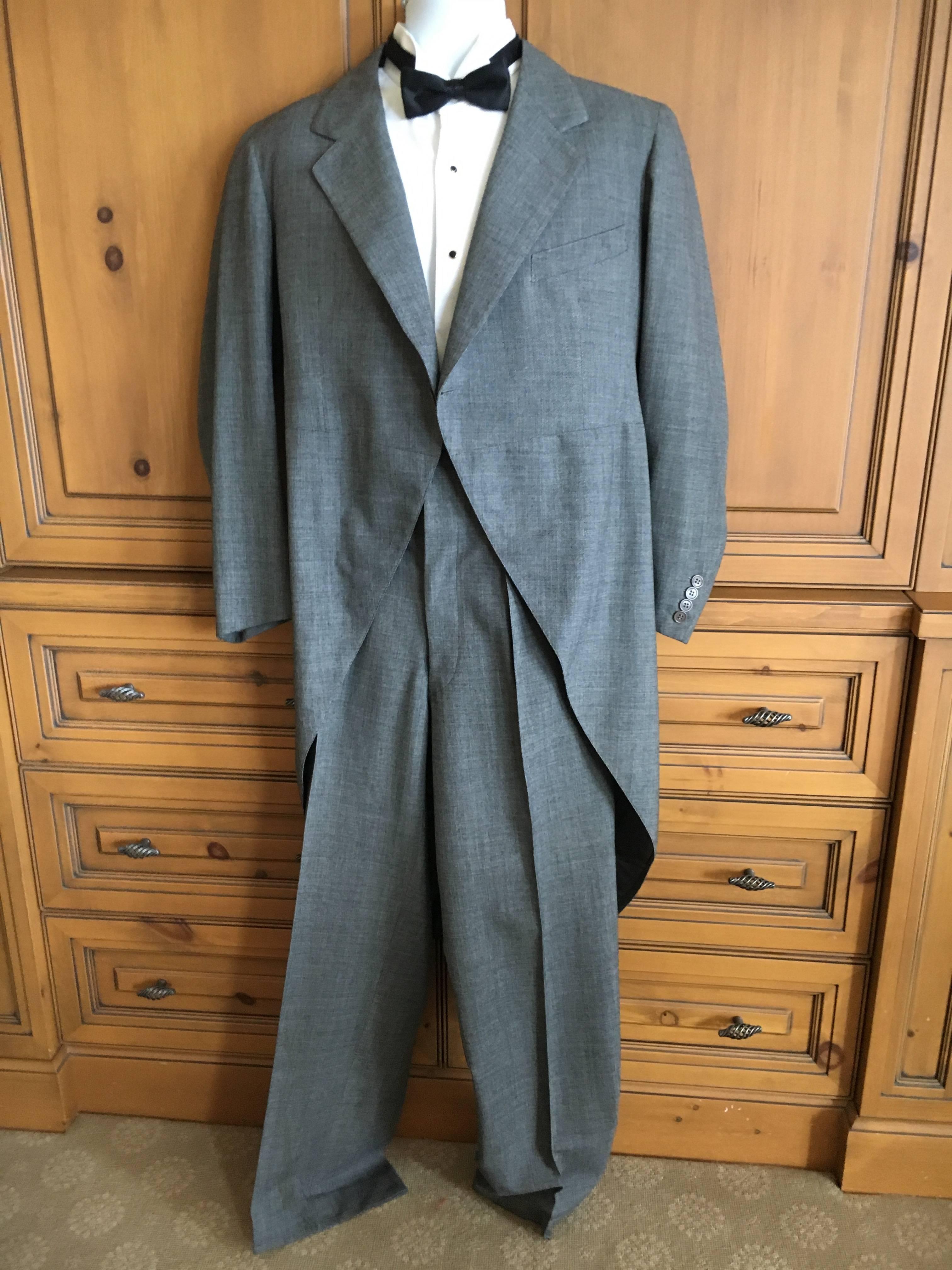 Wonderful summer weight light gray wool formal suit from F.L. Dunne & Co.
F.L. Dunne & Co. was a society tailor in NY and Boston, discreetly tailoring suiting and formal wear for  high society for almost century.
The owner was a polo playing