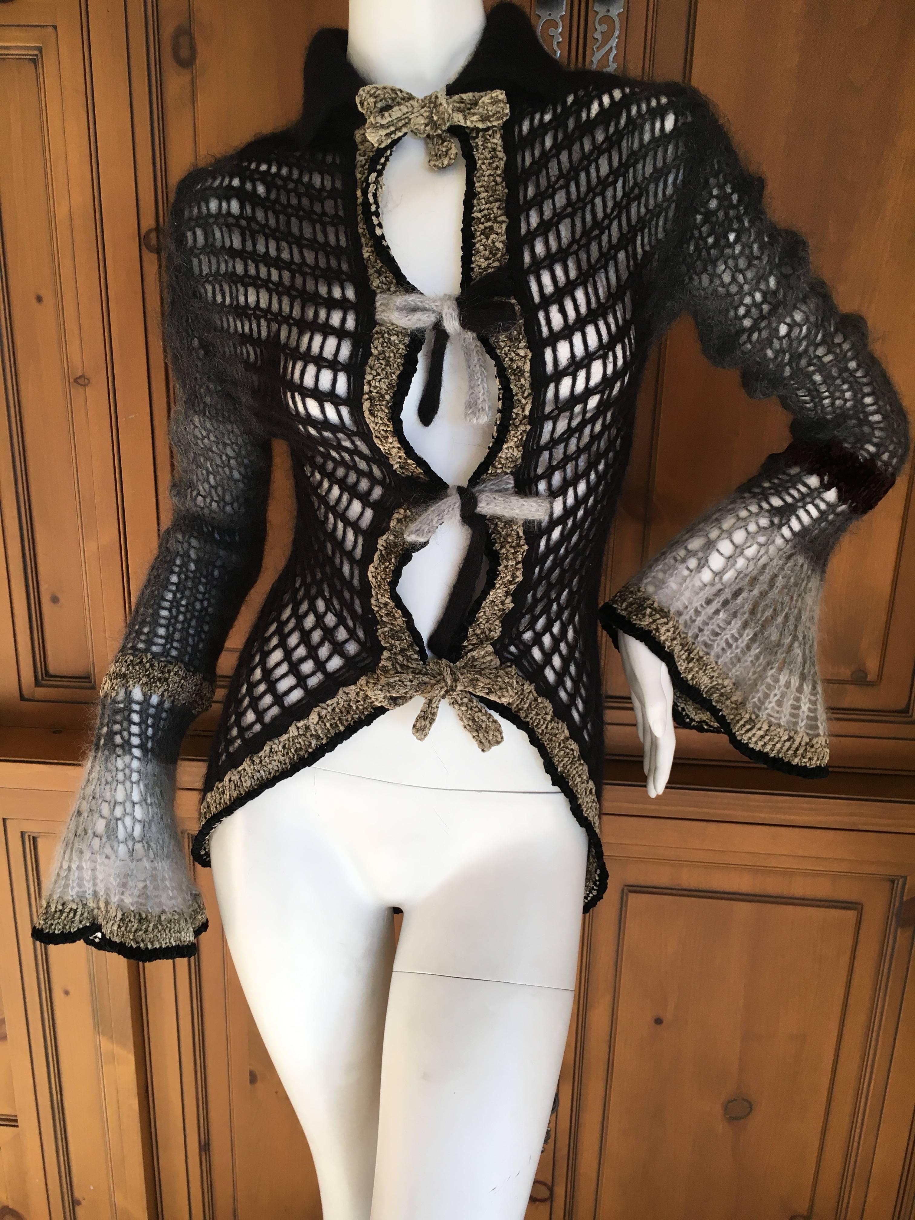 Jean Paul Gaultier Maille Femme Ombre Crochet Bell Sleeve Sweater.
Gray to black gradation, this is such a pretty sweater.
Very loose crochet knit sweater with tie front. 
New with tags
Size Small
Bust 36