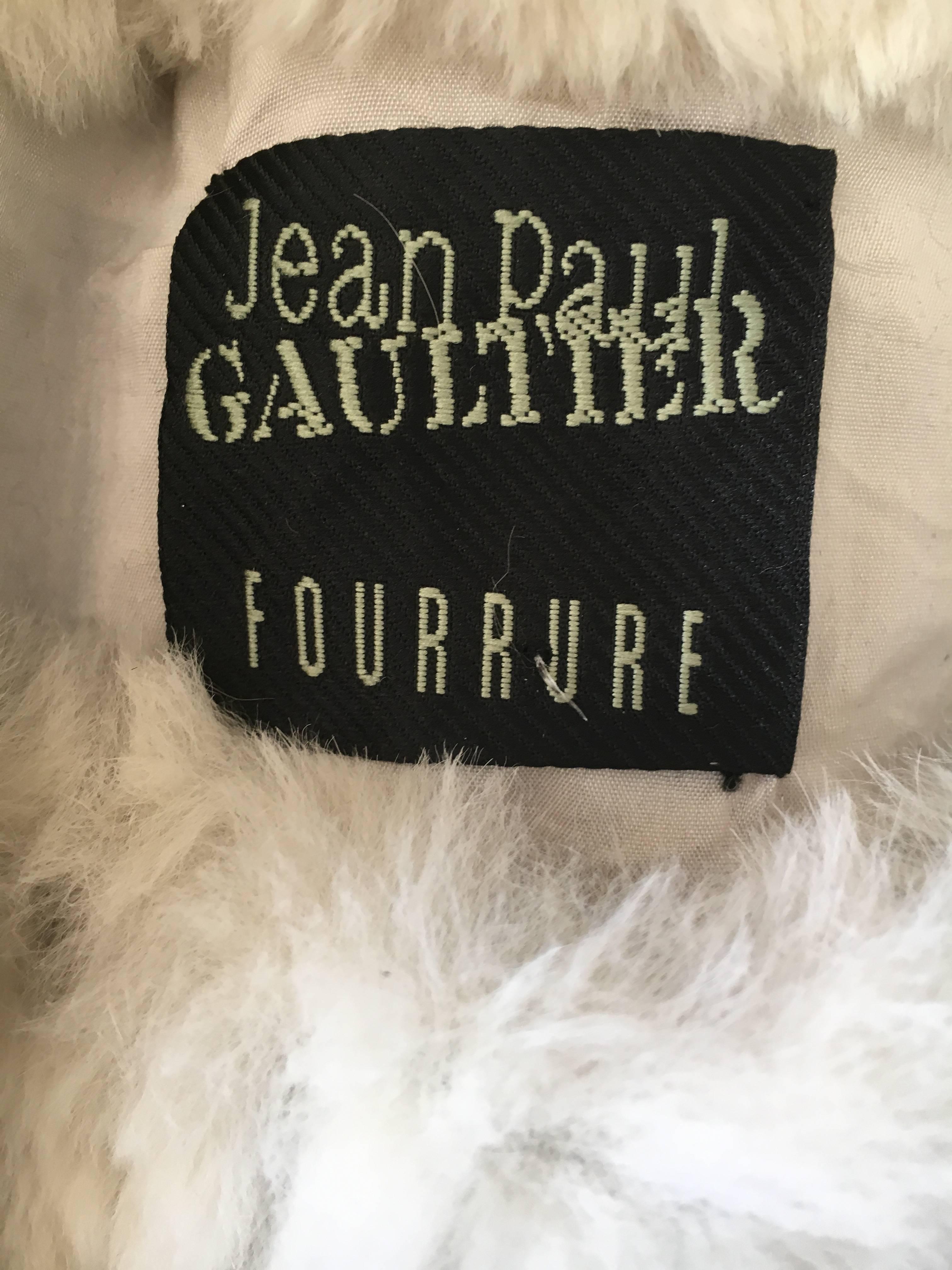 Rare Jean Paul Gaultier Fourrure nautical stripe fur sailor top.
This was featured in the opening vignette of the Jean Paul Gaultier Retrospective which toured museums word wide. It was featured on a male mannequin, and is unisex.
There is not a fur