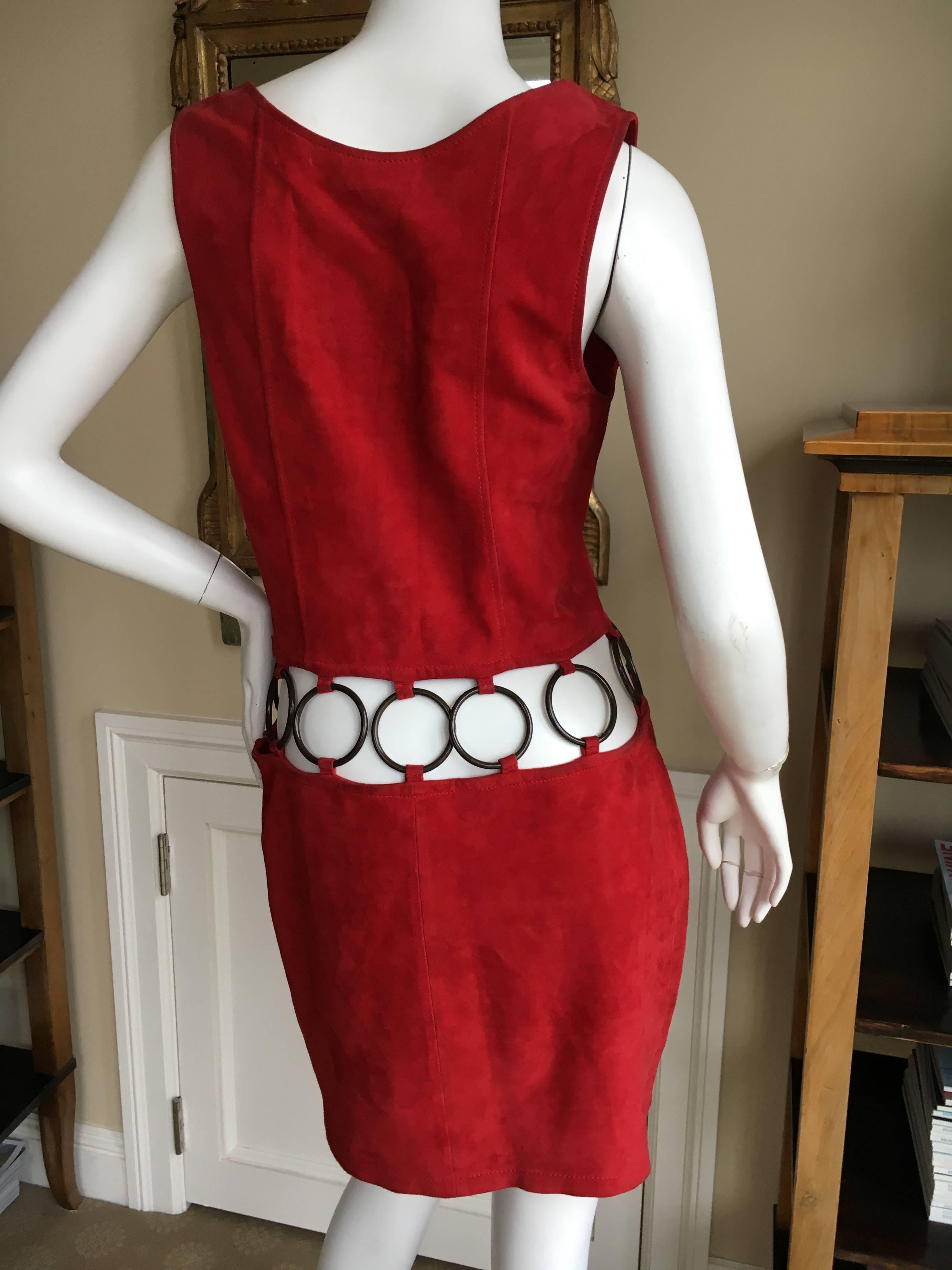 Yves Saint Laurent Swinging Seventies Suede Go Go Dress.
Red suede with large gunmetal O rings.
Size 40
Bust 36