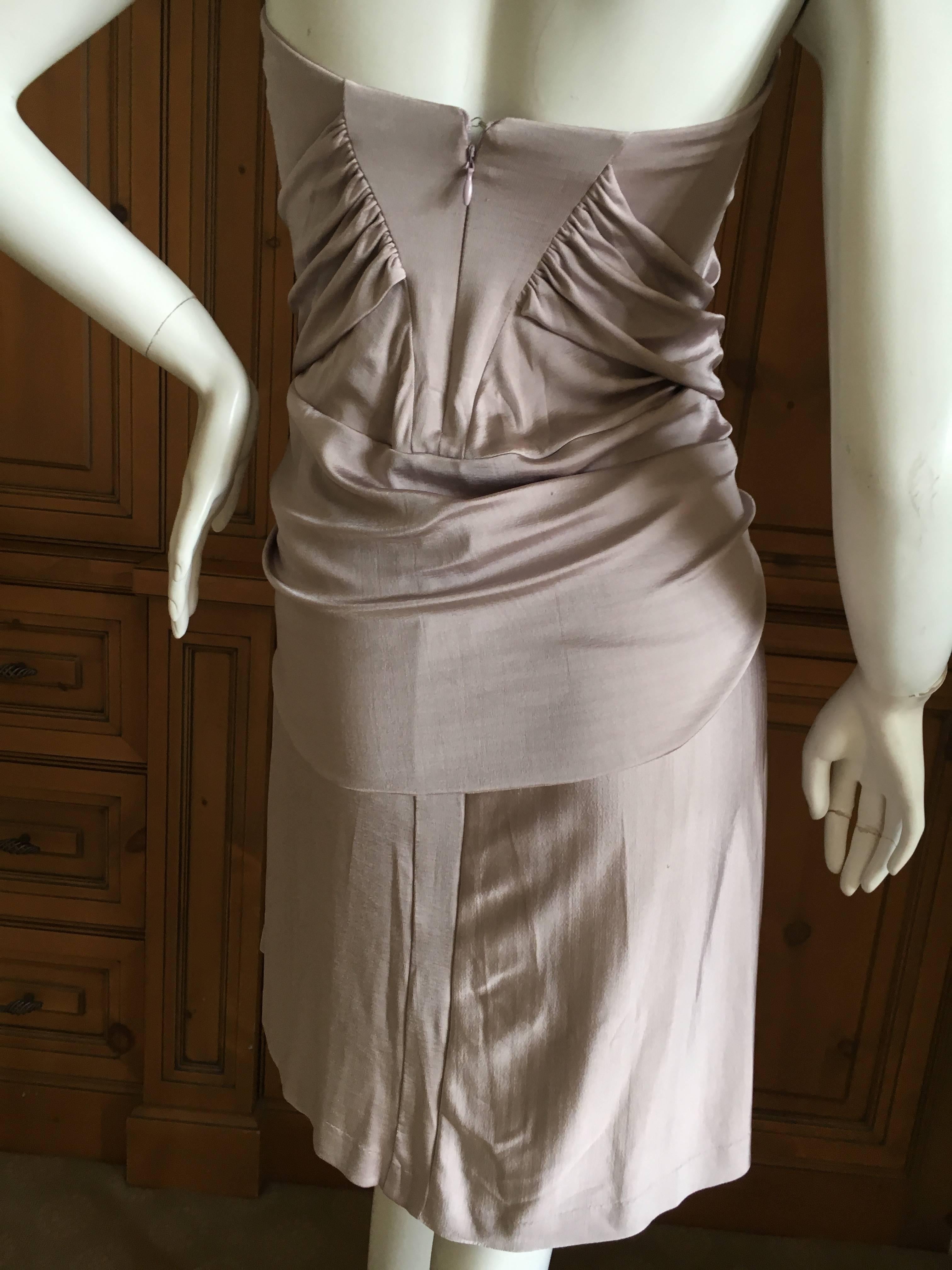 Wonderful gray ruched dress from Tom Ford for YSL, 2002.
Size L
Bust 34"
Waist 32"
Hips 38"
Length 31"
Excellent condition