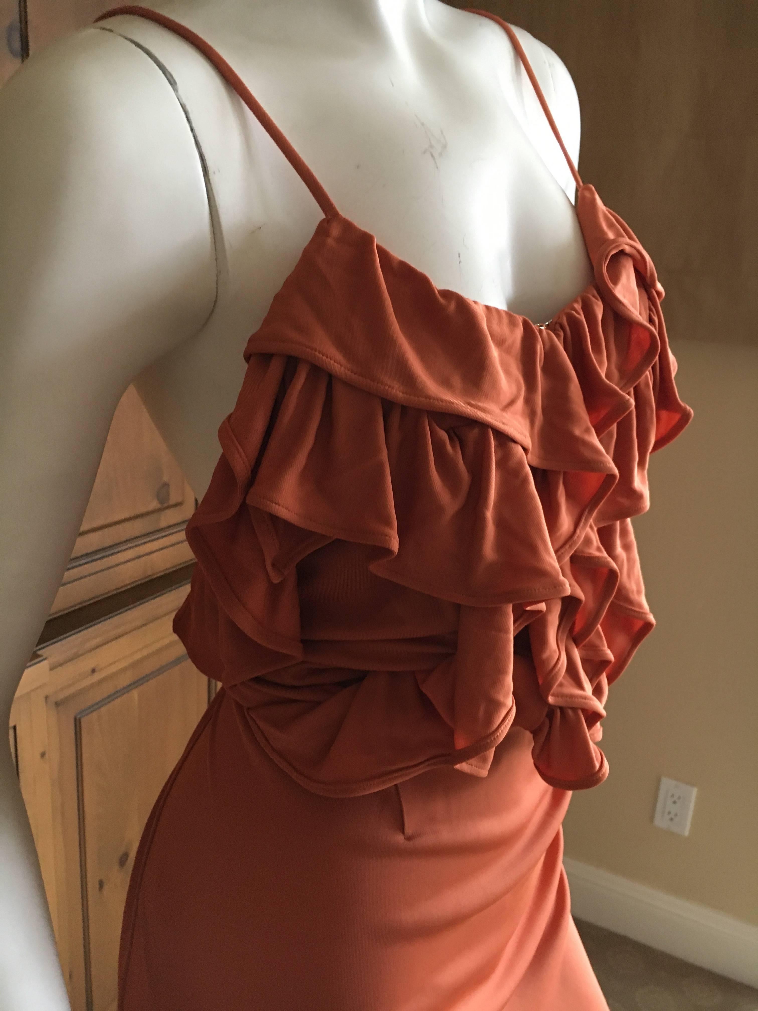 Festive orange ruffle dress from John Galliano.
Size 42
Bust 38'
Waist 30