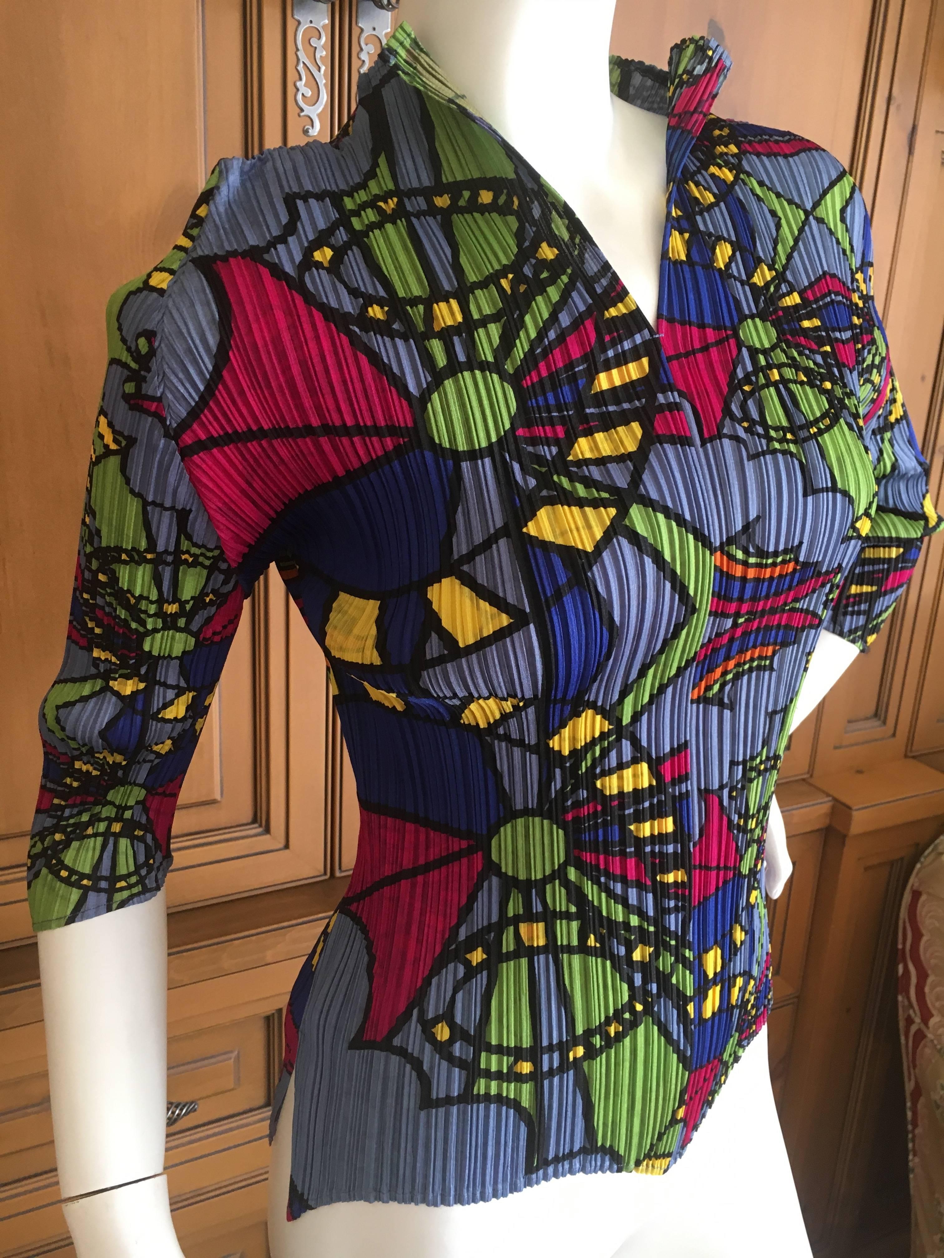 Issey Miyake Pleats Please 60's Inspired Colorful Top
SO Peter Max
There is a lot of stretch.
Bust 38"
Length 24"
Excellent condition
