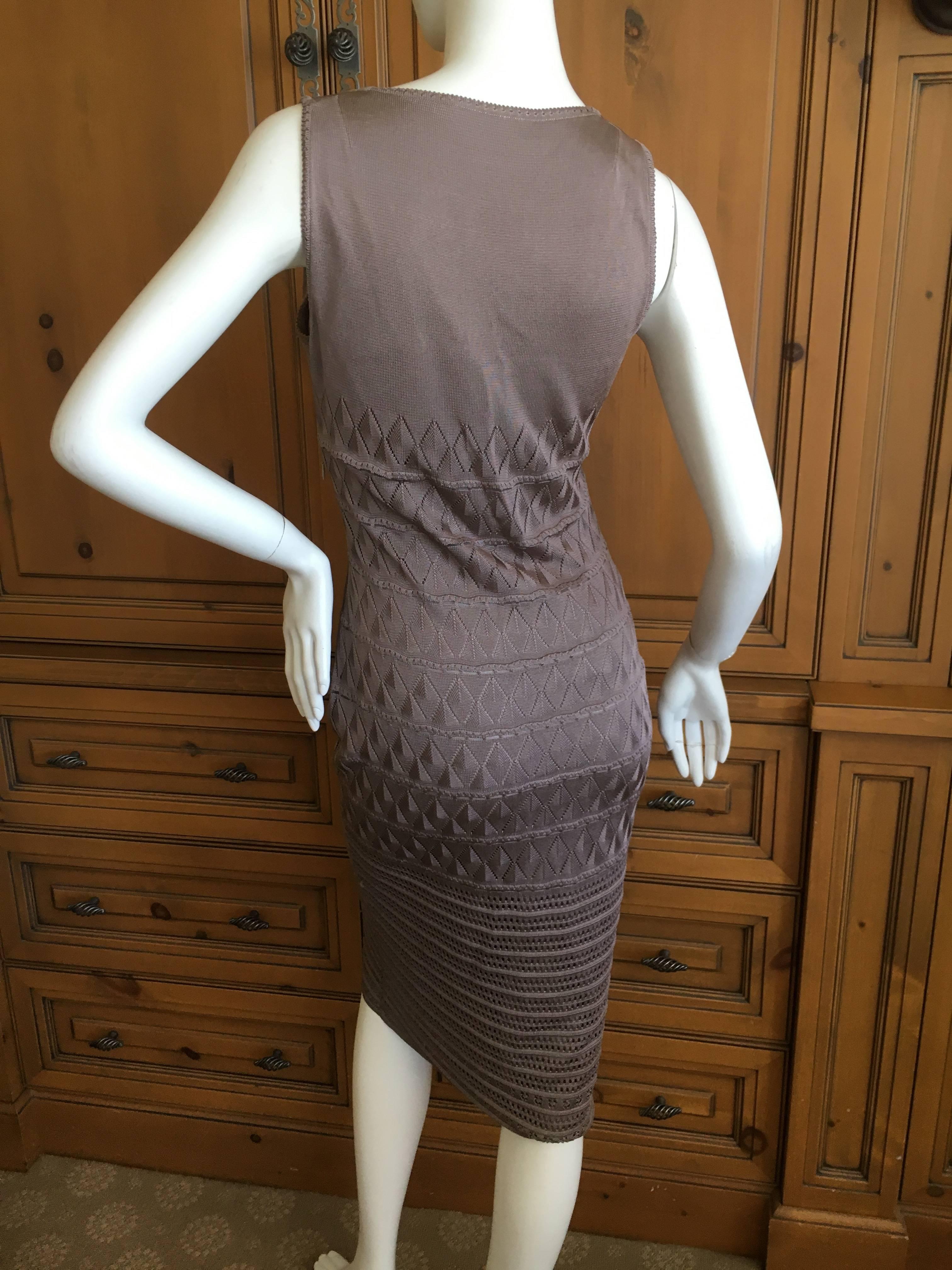 John Galliano f990's Gray Diamond Pattern Knit Dress with Matching Cardigan.
Sz M
Bust 36"
Waist 28"
Hips 38"
Length 44"
Great pre owned condition