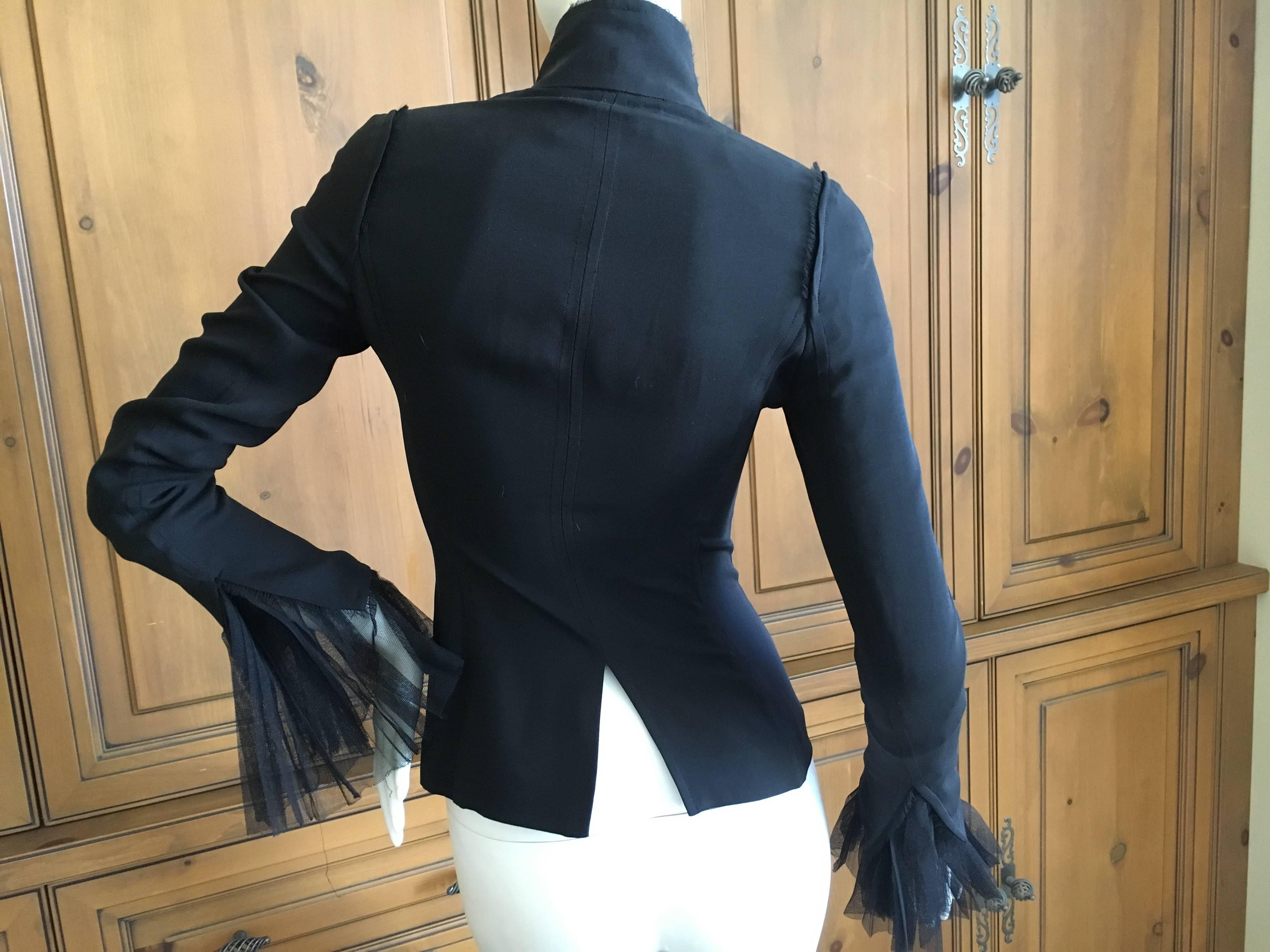 Yves Saint Laurent by Tom Ford Tie Front Black Jacket.
Size 36
Bust 34"
Waist 26"
Length 25"
Excellent condition