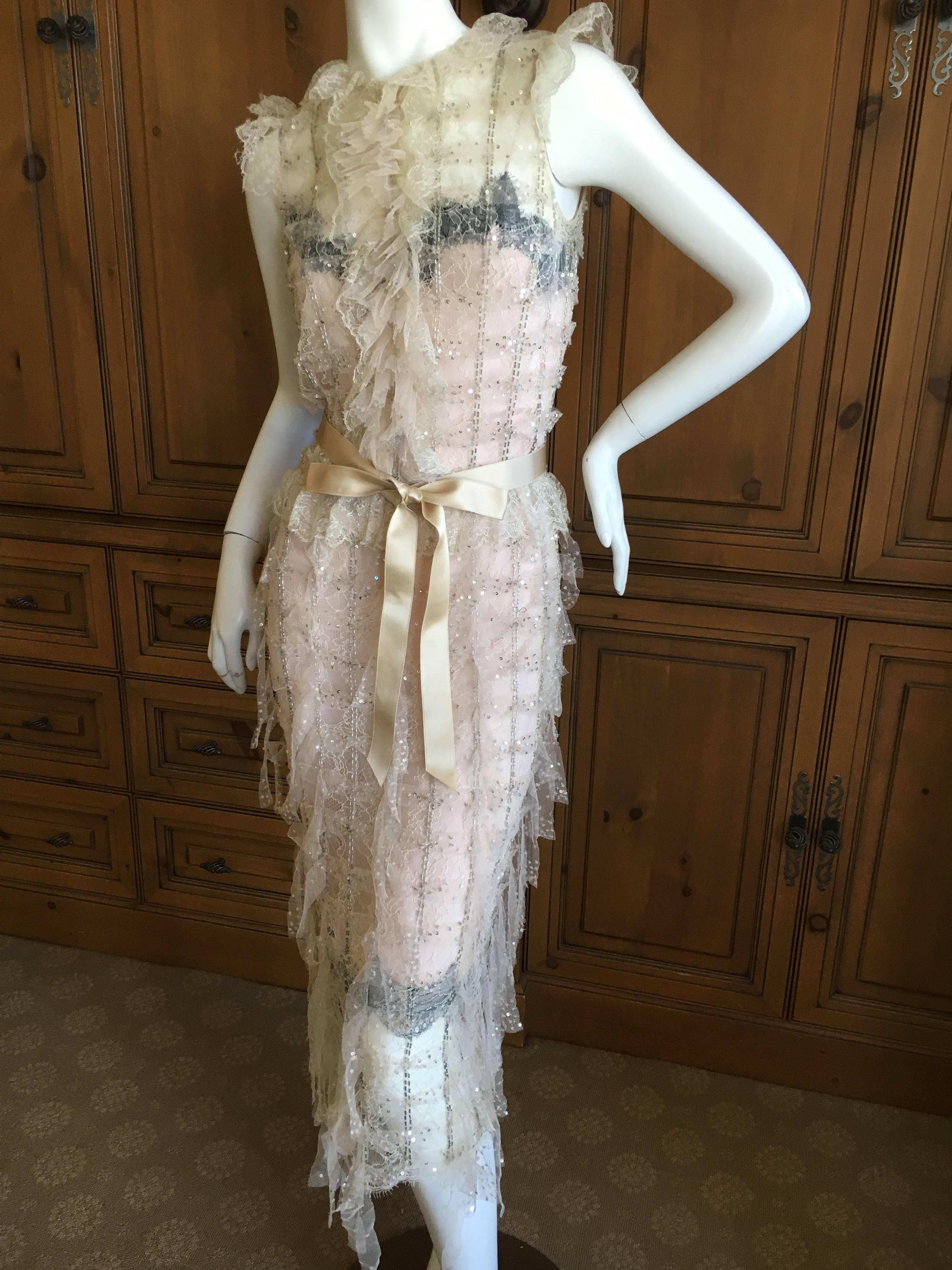  Oscar de la Renta Sheer Embellished Vintage Tiered Ruffle Evening Dress 
With slip and Ribbon belt
This is so beautiful, but hard to capture in photographs.
 The fabric is sheer with bugle beads throughout.
 size 0 
Bust 34"
 Waist 27"
