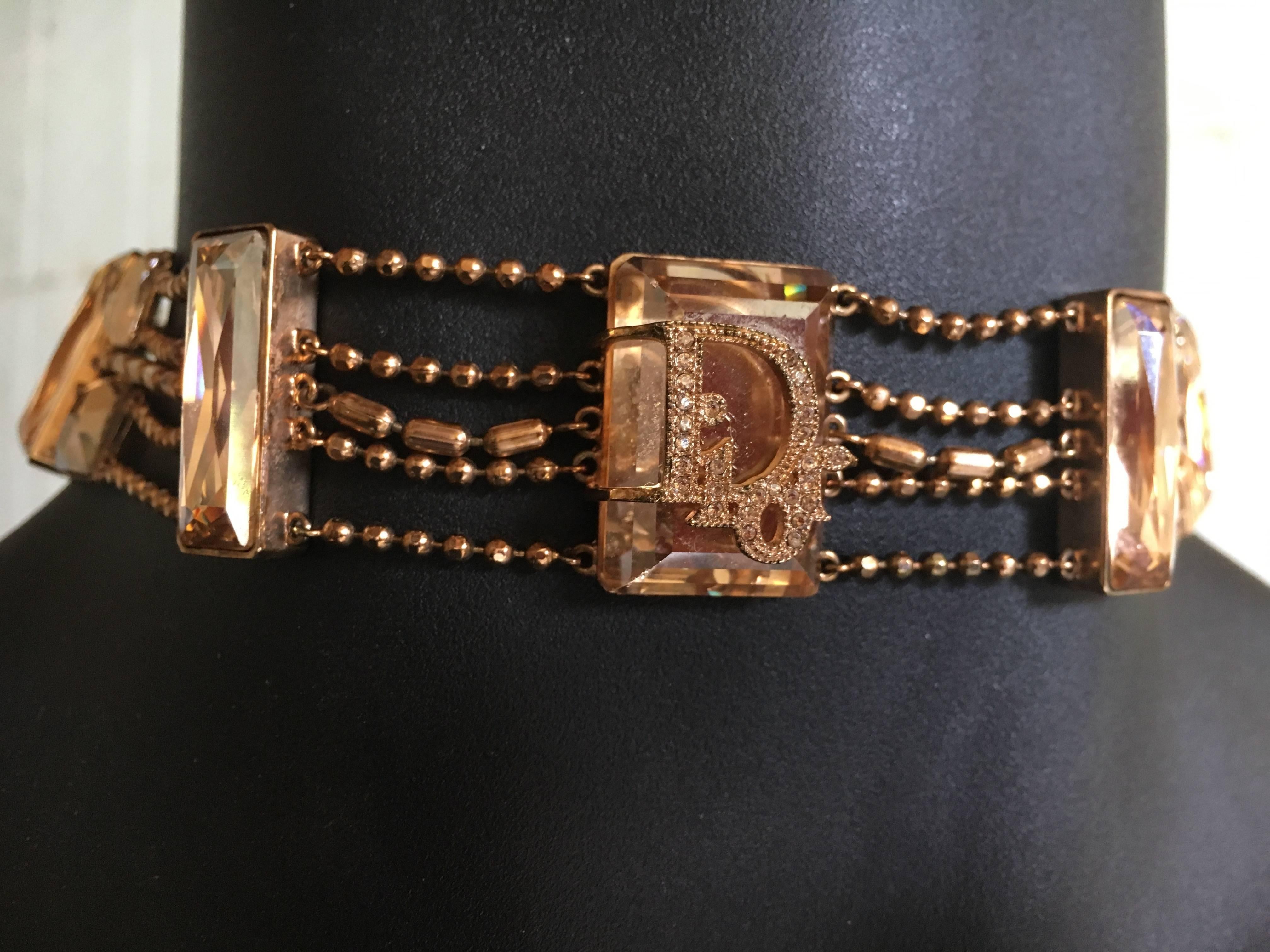 Christian Dior by Galliano Rare Crystal Chocker.
This is stunning, the color's so pretty.
The color of the metal is rose gold, and the crystals are a very pale gold tone called light topaz.
There is an extender chain.
Comes in original box.
1