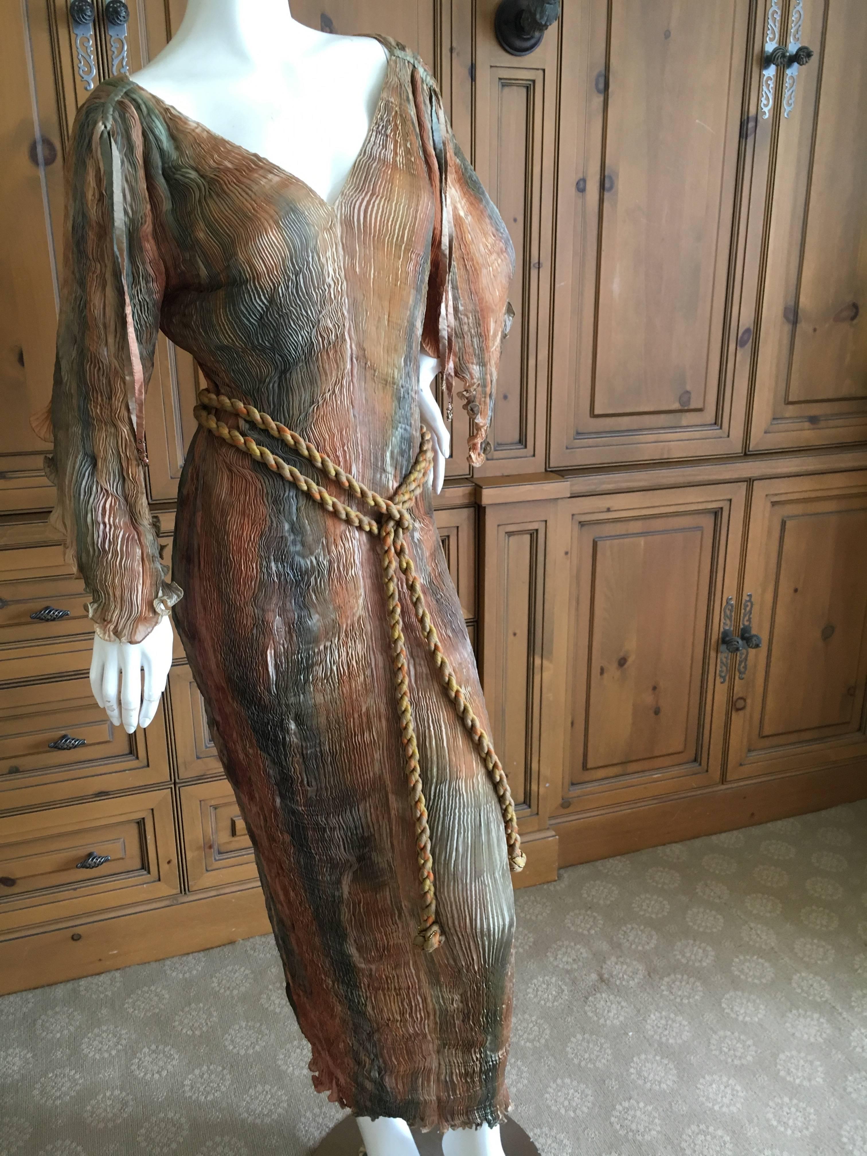 Patricia Lester Wales Rare Hand Dyed Plisse Pleated Low Cut Dress with Belt and Bag.
This is a tie dye the of dying process.
Patricia Lester Fortuny Style Plisse Pleated Dress. Created painstakingly by hand in Wales, this is plisse pleated in the