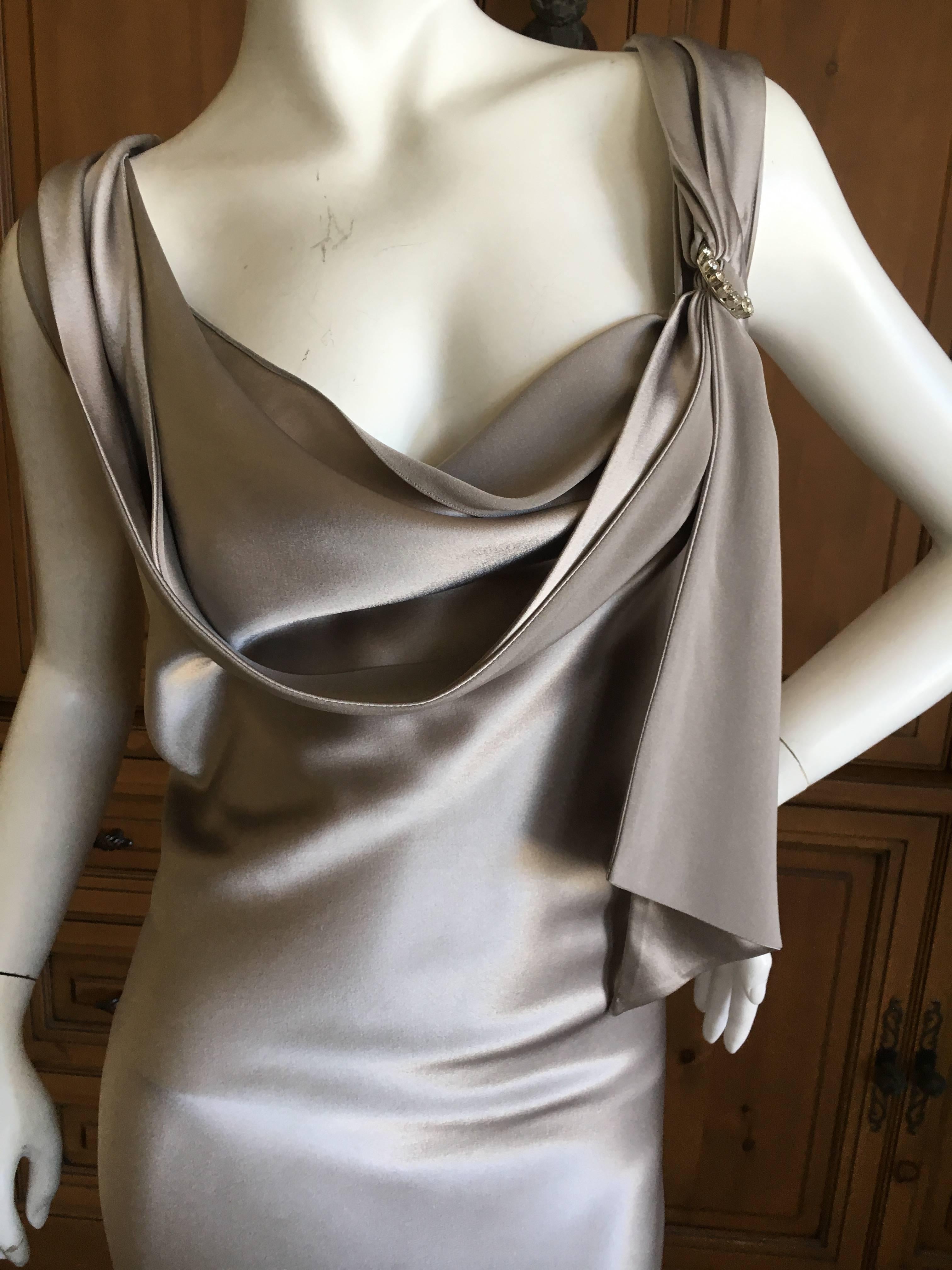 Elegant draped John Galliano Vintage Liquid Silver Dress with Crystal Accents Size 44
Bust 44"
Waist 36"
Hips 46"
Length 51"
Excellent pre owned condition 