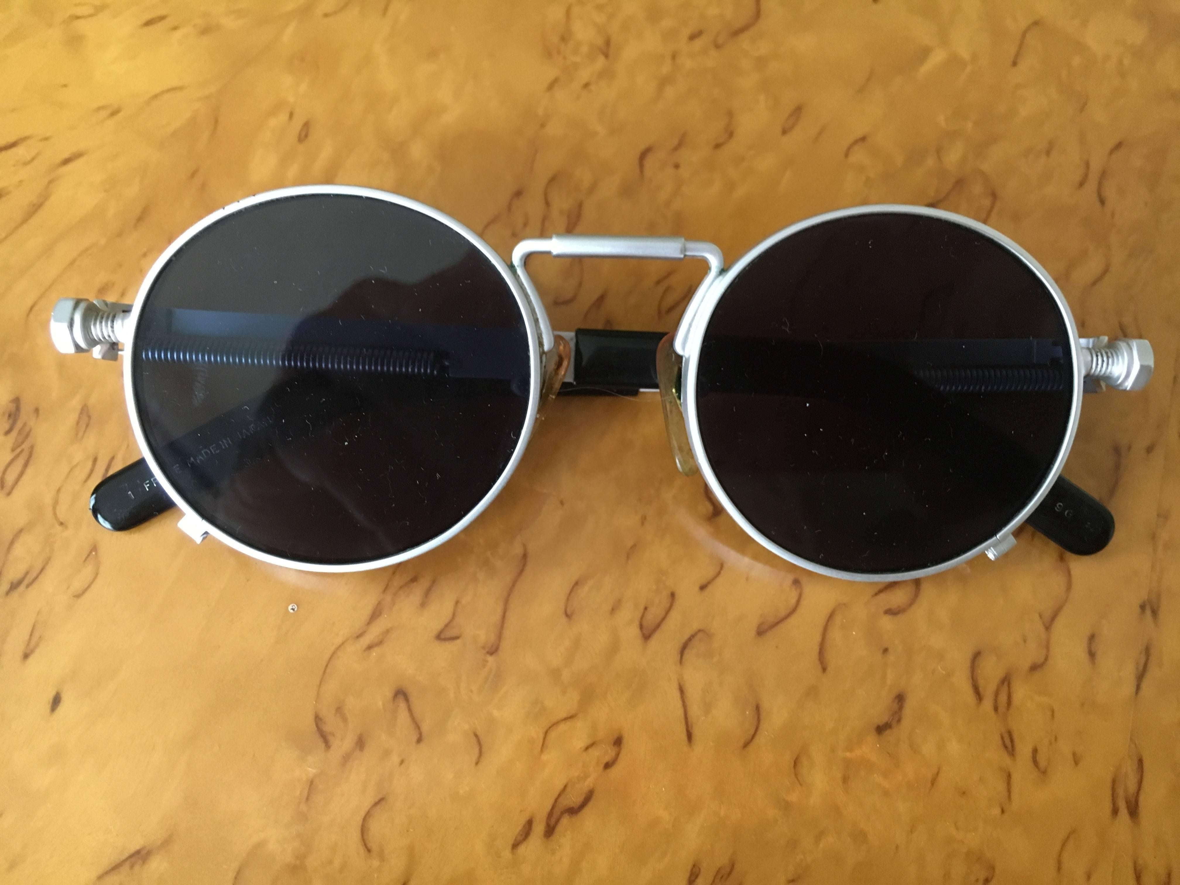 Rare and collectable Jean Paul Gaultier Matte Silver Round Sunglasses.
Stamped  56-8171 Japan
Comes  with  Case