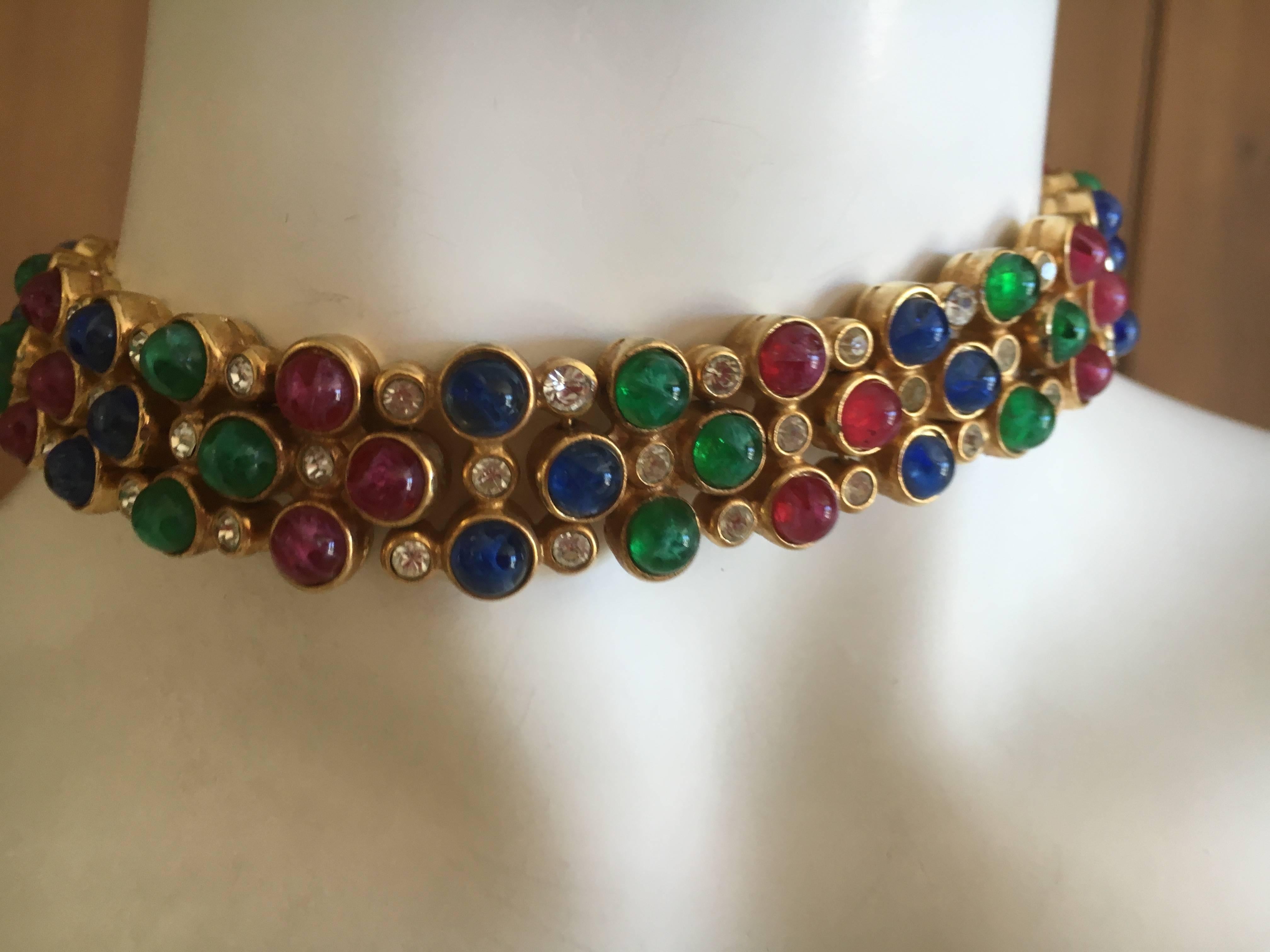 Christian Dior 1960's Tutti Fruity Cabochon Choker from Grosse Germany.
Jewel tones of red green and blue set in gold13"
long with an extender chain
