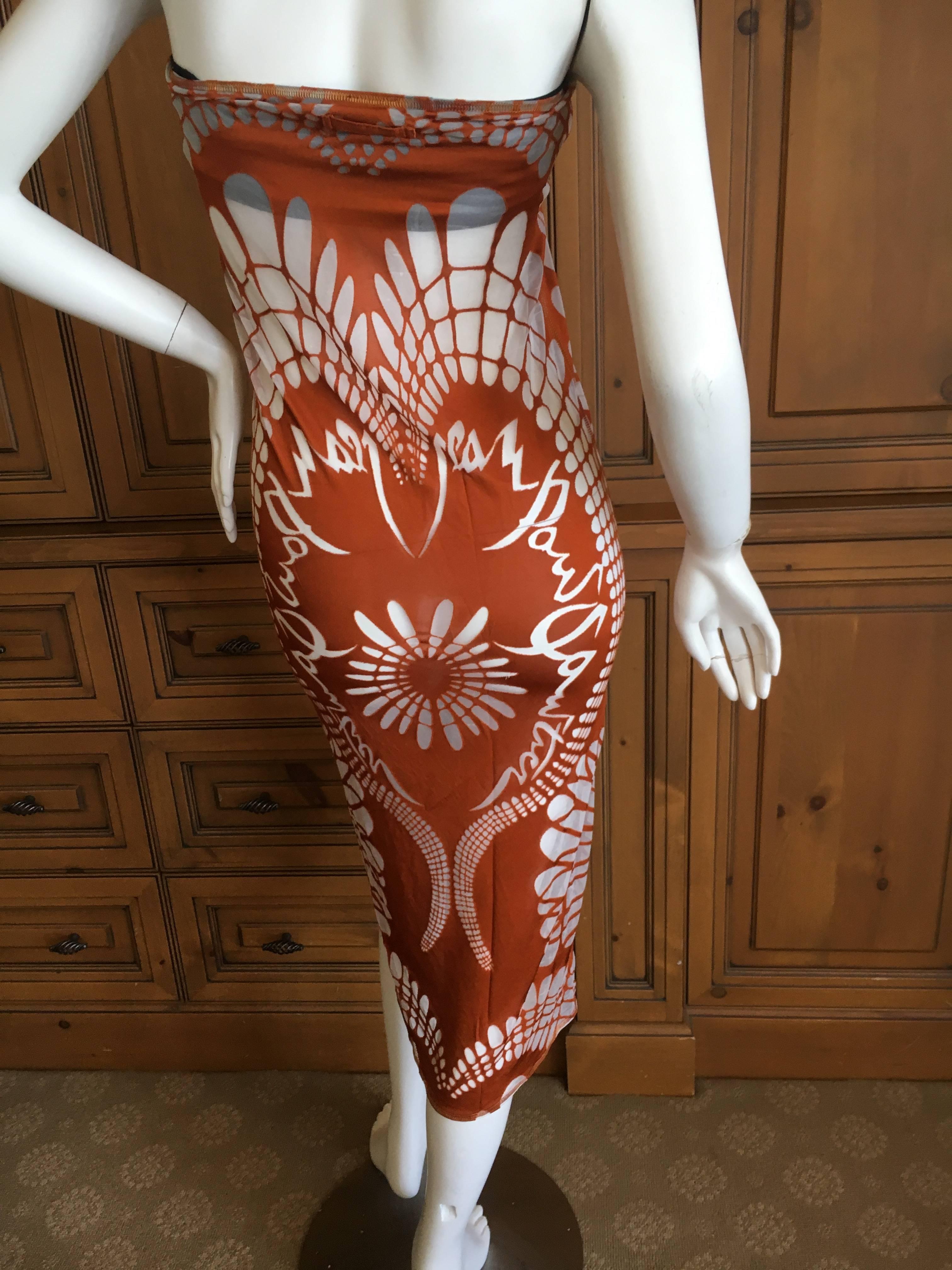Jean Paul Gaultier Femme Vintage Sheer Maori Tattoo Skirt or Dress.
The original owner wore it as a tube dress, as I show it. It has a modesty band of black lining, which can easily be removed.
 Size 36
There is a lot of stretch
 Measurements are