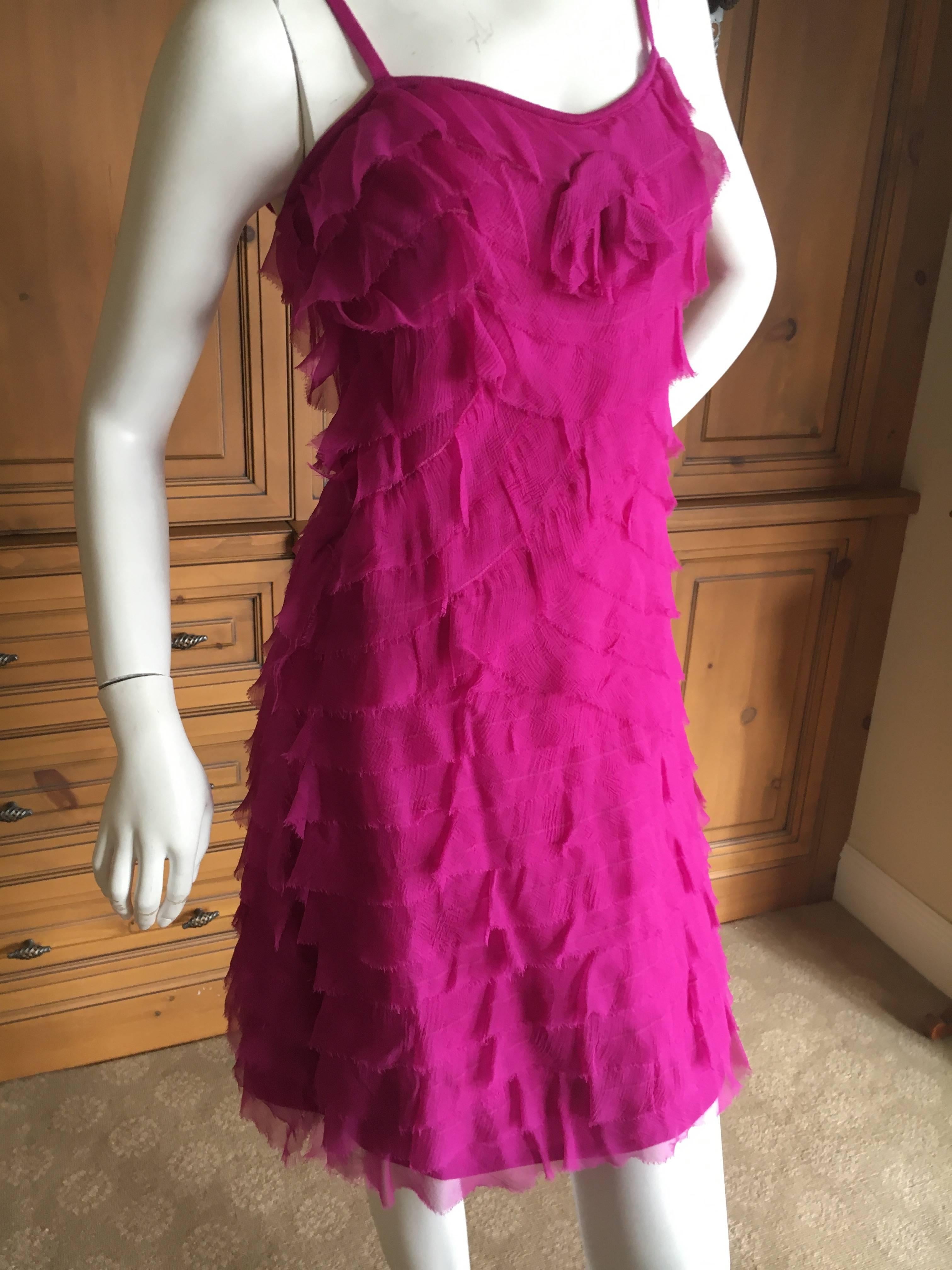 Exquisite knit dress from Christian Dior by John Galliano.
Very fine and soft silk and cashmere knit, with layers of raw edge silk ruffles.
Sie 36, there is a lot of stretch in this.
Bust 34"
Waist 25'
Hips 41'
Length 35"
Excellent