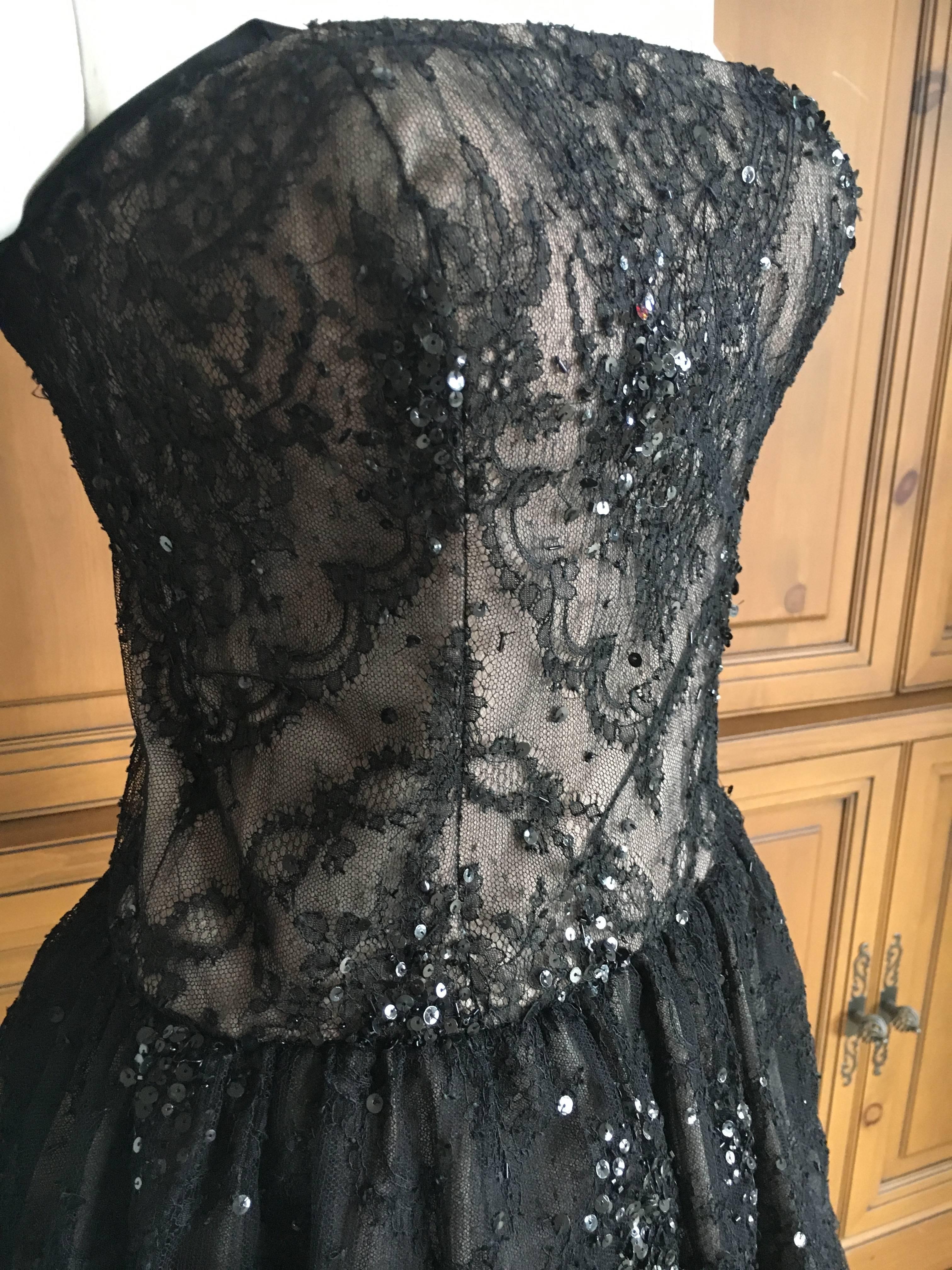 Oscar de la Renta Vintage Black Layered Lace Petal Dress.
There are two satin ribbon shoulder strap's , but I think they were added, not original to the dress.
Size 4
Measurements to follow
