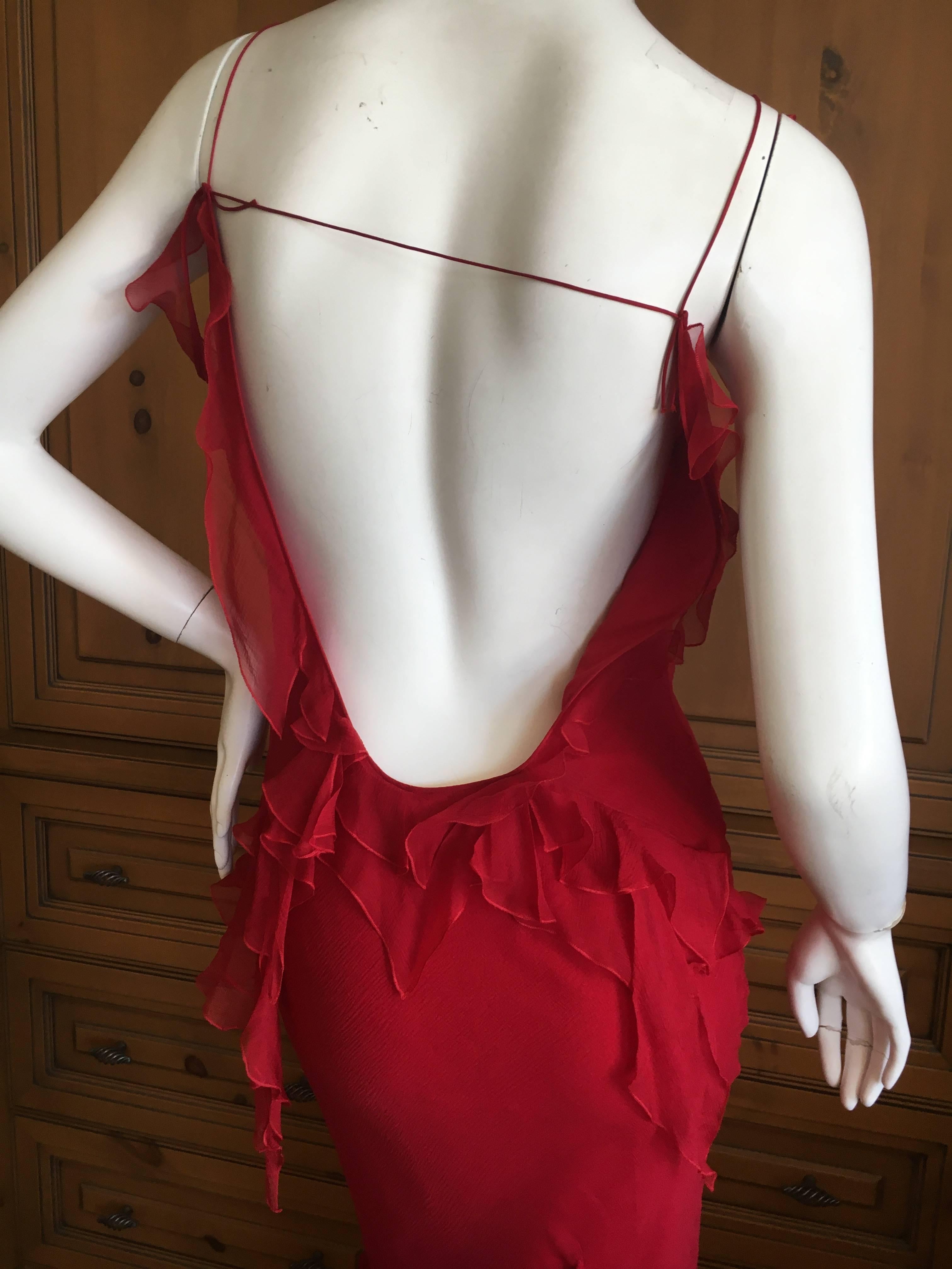 Christian Dior by John Galliano Ruffled Red Silk Dress.
This is so sweet, with multiple layers of sheer silk chiffon and a high slit in the front.
Size 36
Bust 38"
Waist 30"
Waist 39"
Length 59"
Excellent condition