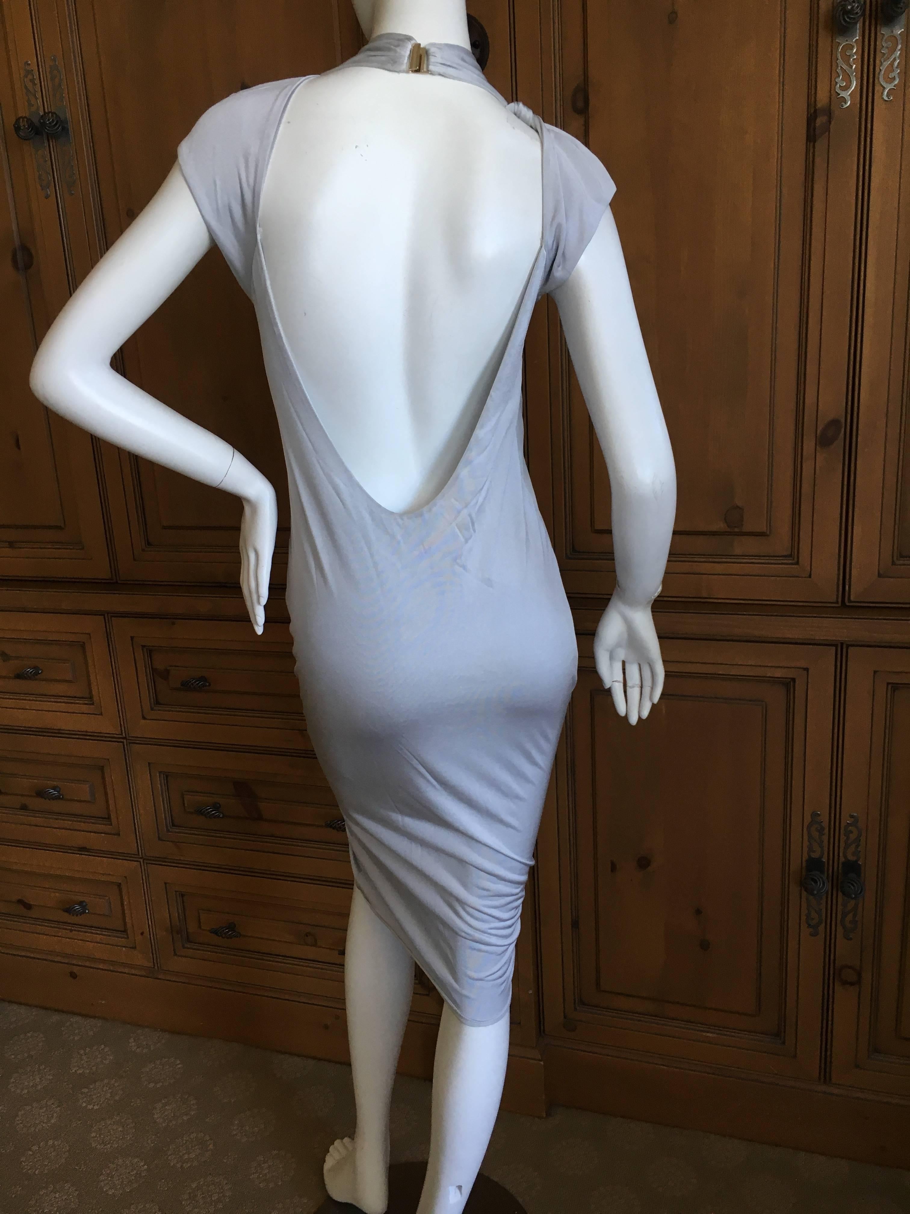 Gucci by Tom Ford Silver Backless Keyhole Dress.
So sexy, size M