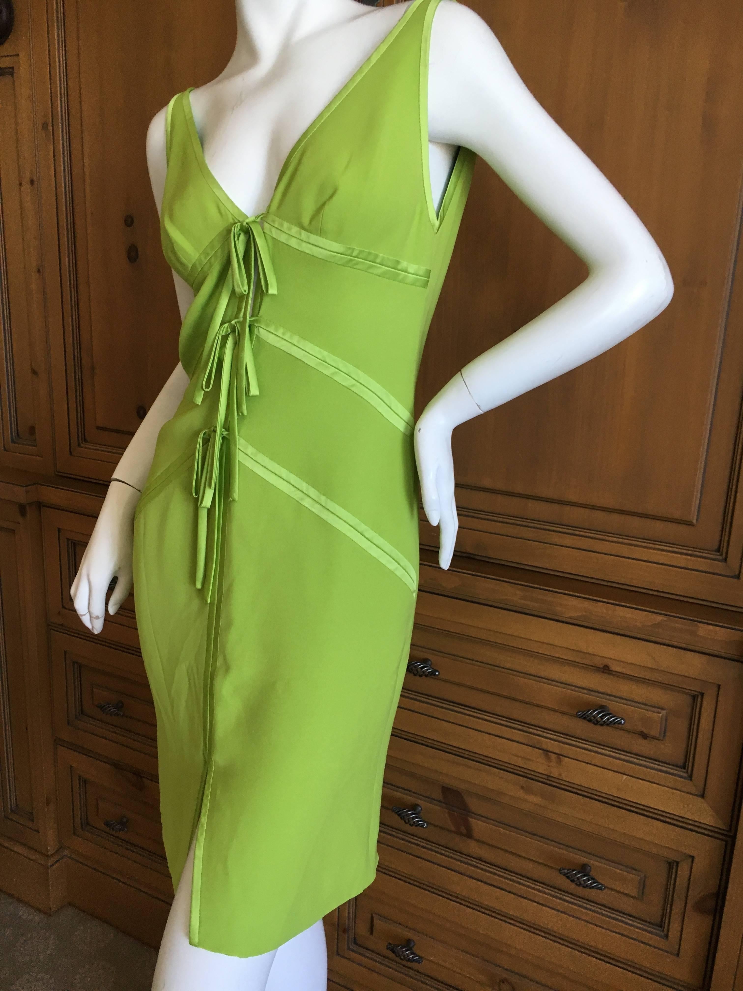 Valentino Vintage Green Silk Cocktail Dress with Peek a Boo Keyhole Details.
This is so  much prettier than the photo's show. 
Size 4