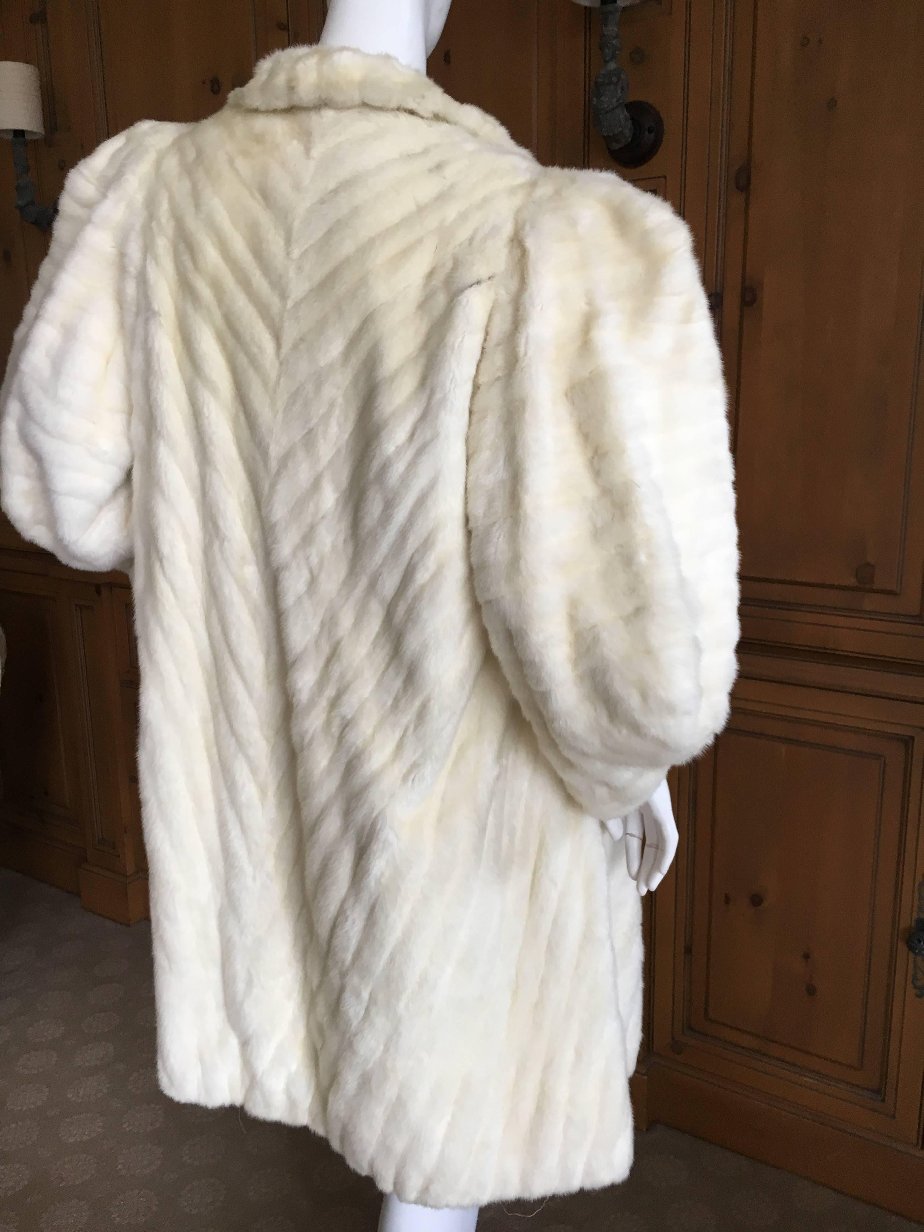 white ermine fur coat