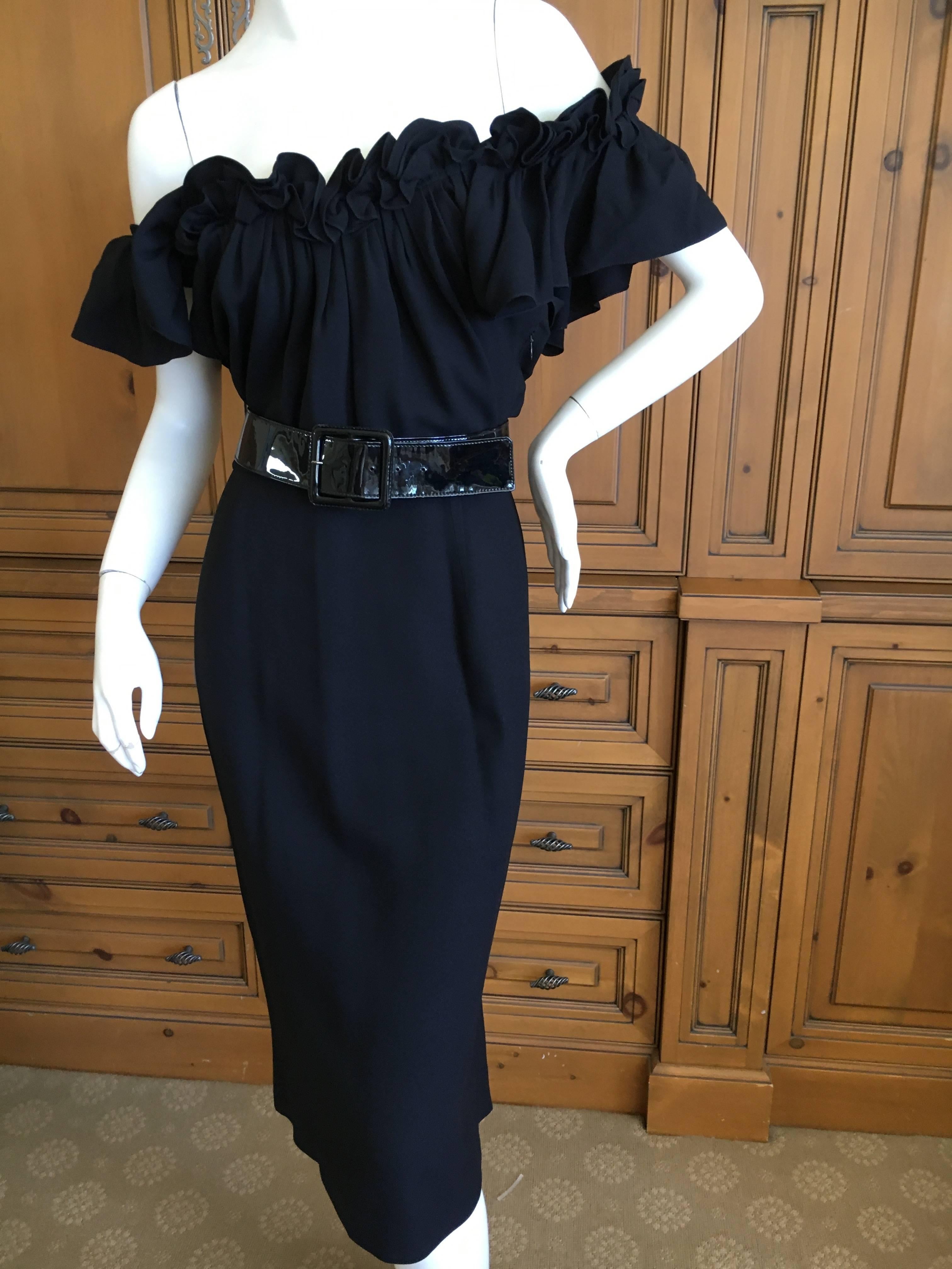 Christian Dior by John Galliano Little Black Dress with Off the Shoulder Ruffle.
The belt in the photos is YSL and will be included, the original belt is no longer with the dress.
Size 38
Bust 38