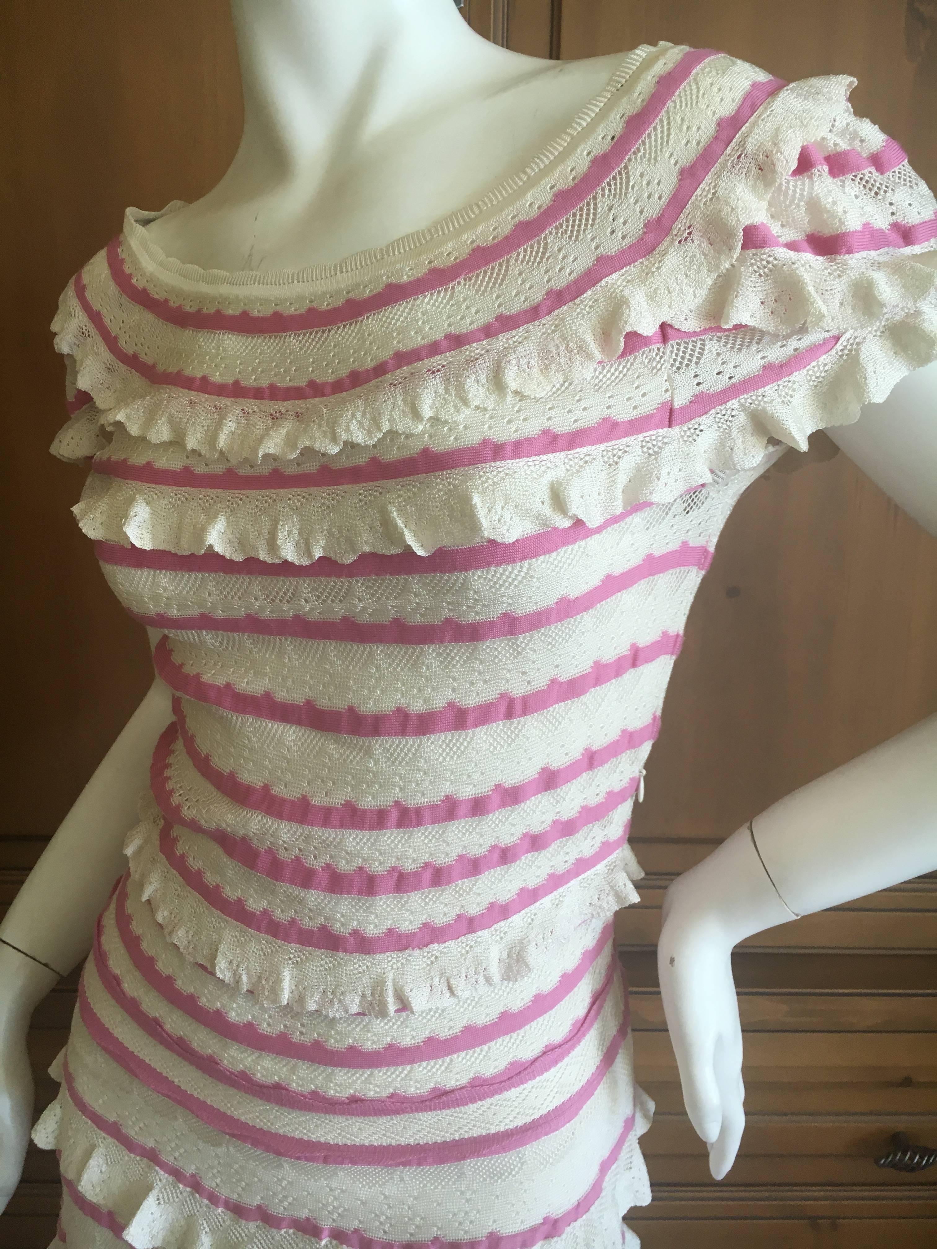 Christian Dior by John Galliano Romantic Ruffled Pink and Cream Knit Dress.
This is so much prettier than the photos show. 
Very romantic with layers of ruffles accented with pink. 
Size 38
Bust 37