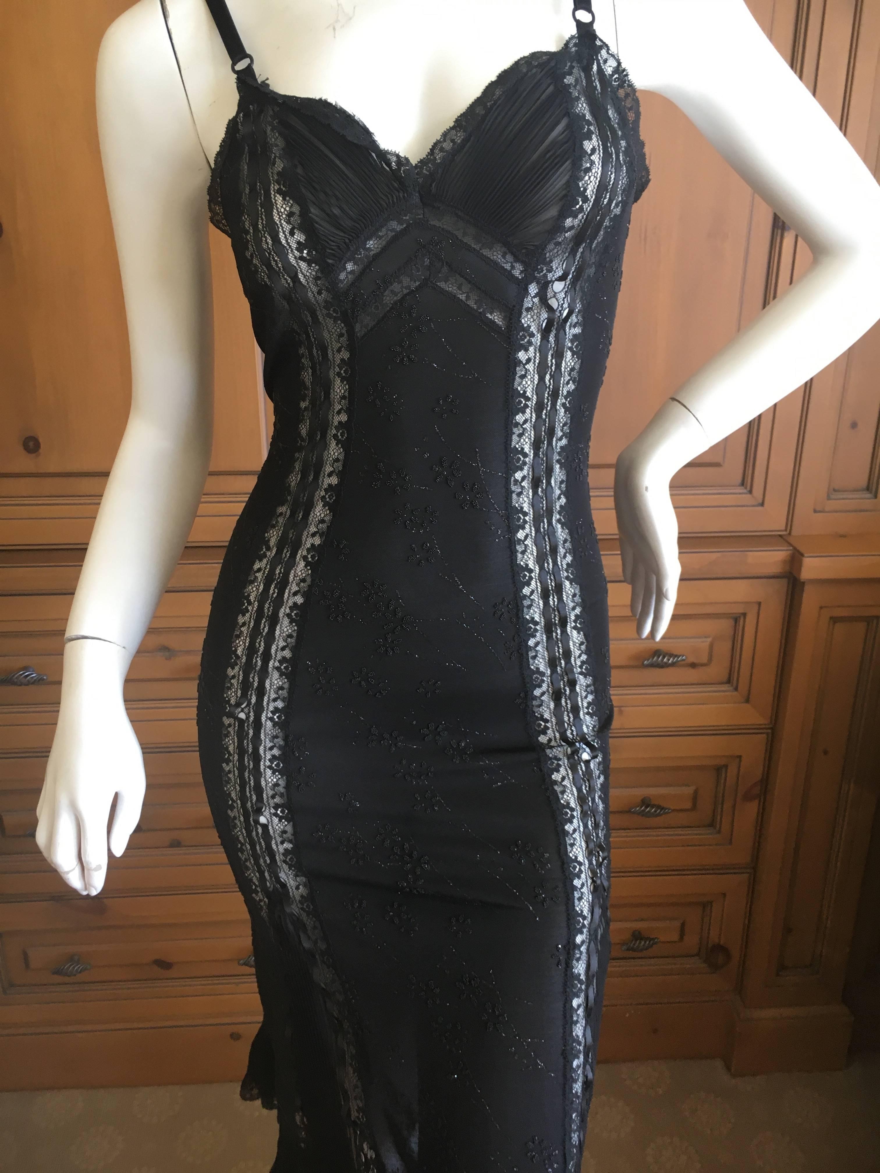 D&G Dolce & Gabbana Vintage Lace Overlay Sheer Little Black Cocktail Dress.
New with tags.
So sexy, this dress has it coming and going.
Very hard to see but this is embellished all over with tiny beads.
Size 42
Bust 36
