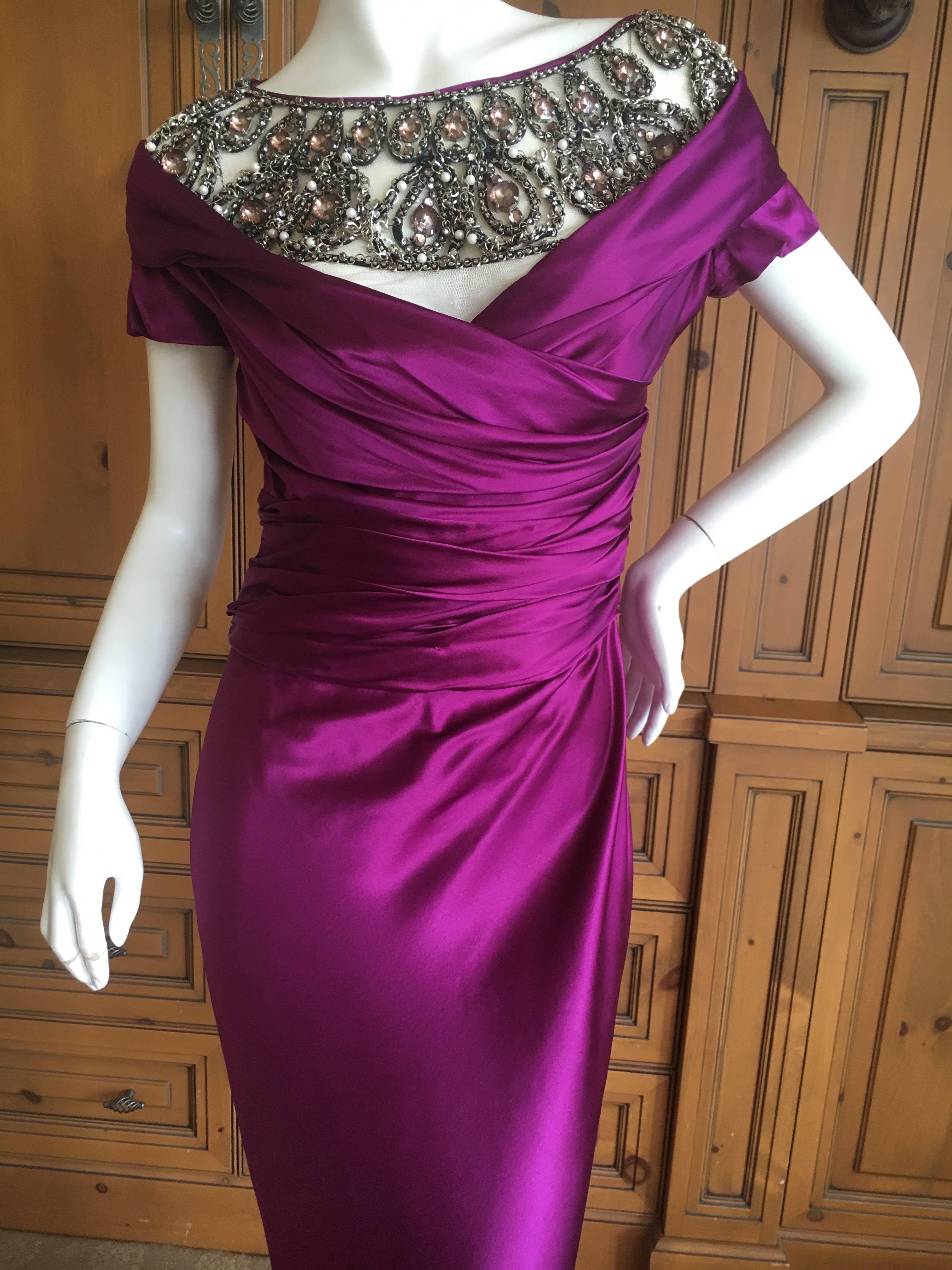 Wonderful purple evening dress with the most gobsmacking "jeweled" collar.
There is an inner corset.
Simply sublime
Size 36
Bust 38"
Waist 28"
Hips 42"
Length 53"
Execllent condition