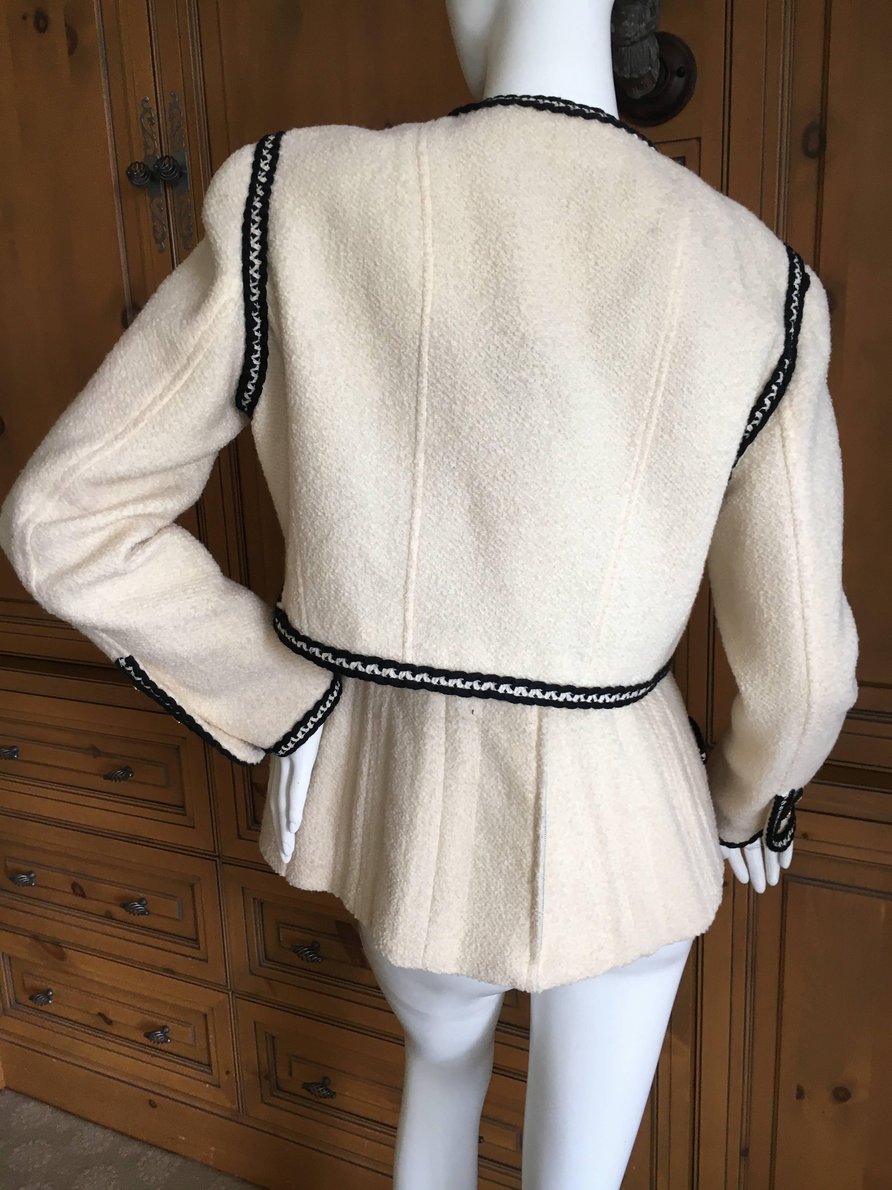 Chanel Vintage Ivory Cropped Jacket with Contrasting Trim and Nine CC Buttons
Printemps 1993.
Size 42
Bust 42