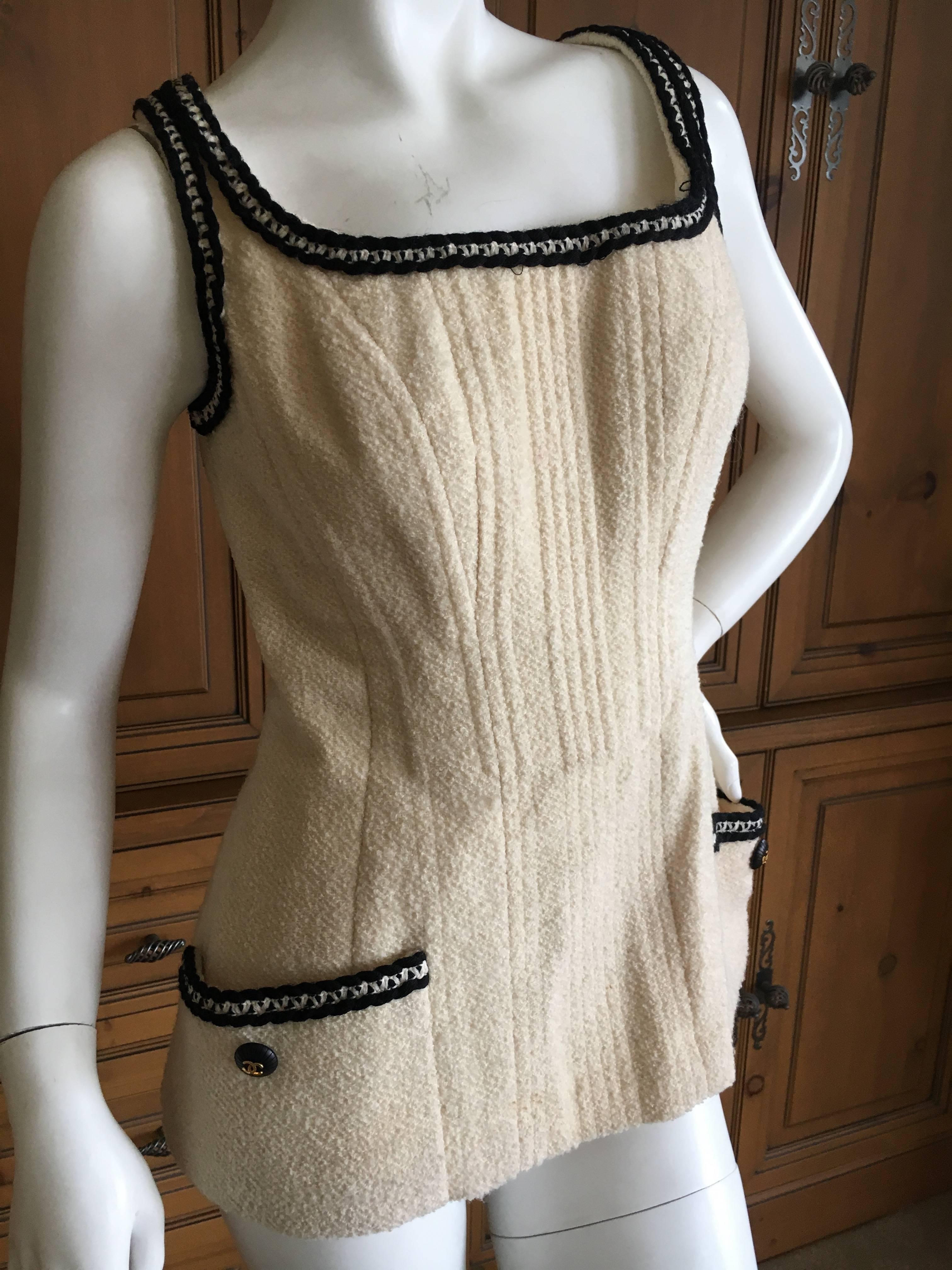 Chanel Vintage Sleeveless Ivory Boucle Top with Tweed Trim.
Zips up the back.
From Spring 1993
Size 42
Bust 38
