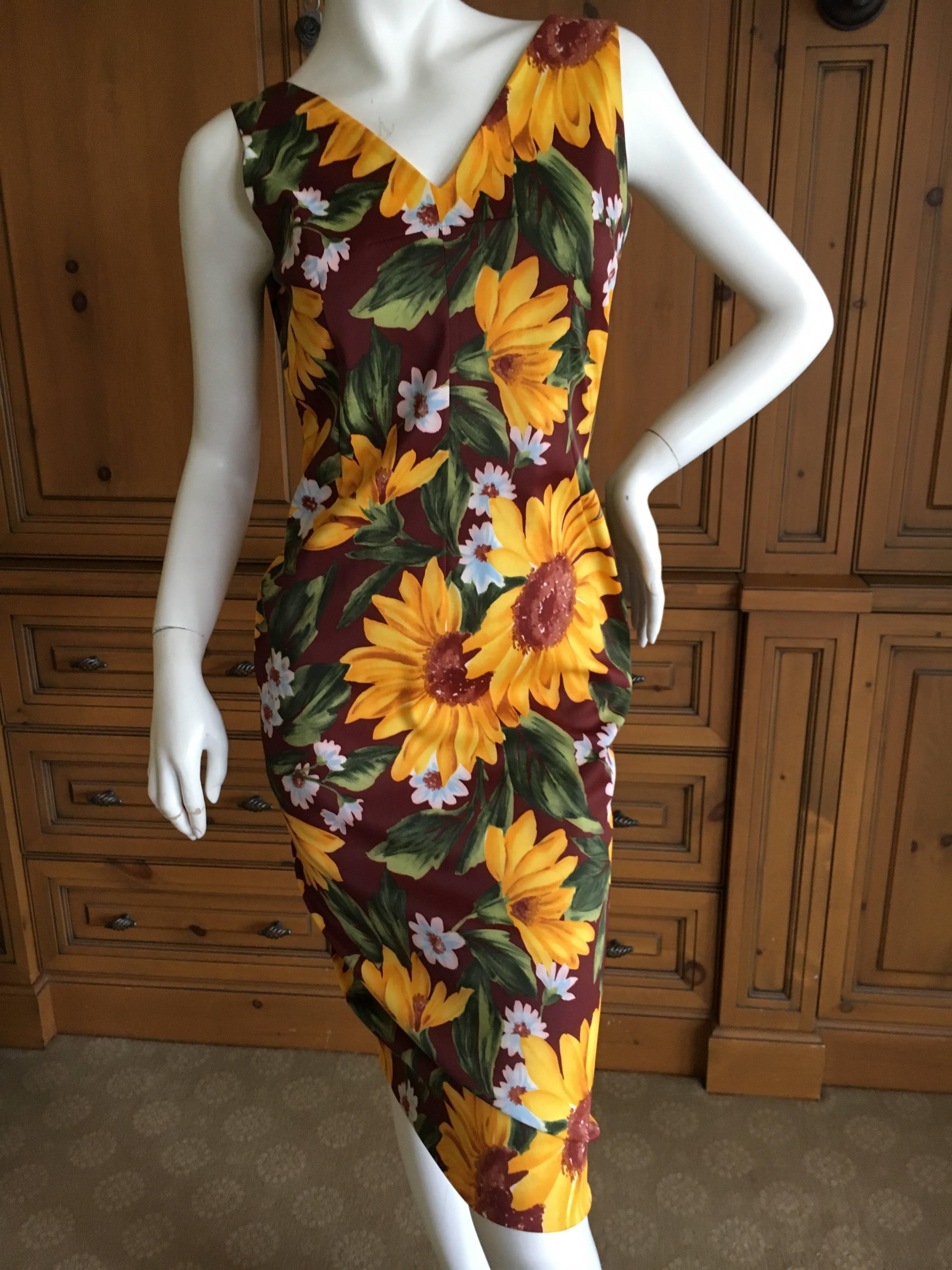 D&G Dolce & Gabbana Sunflower Dress .
Cut with a low back, this is so sweet.
Size 42
Bust 38