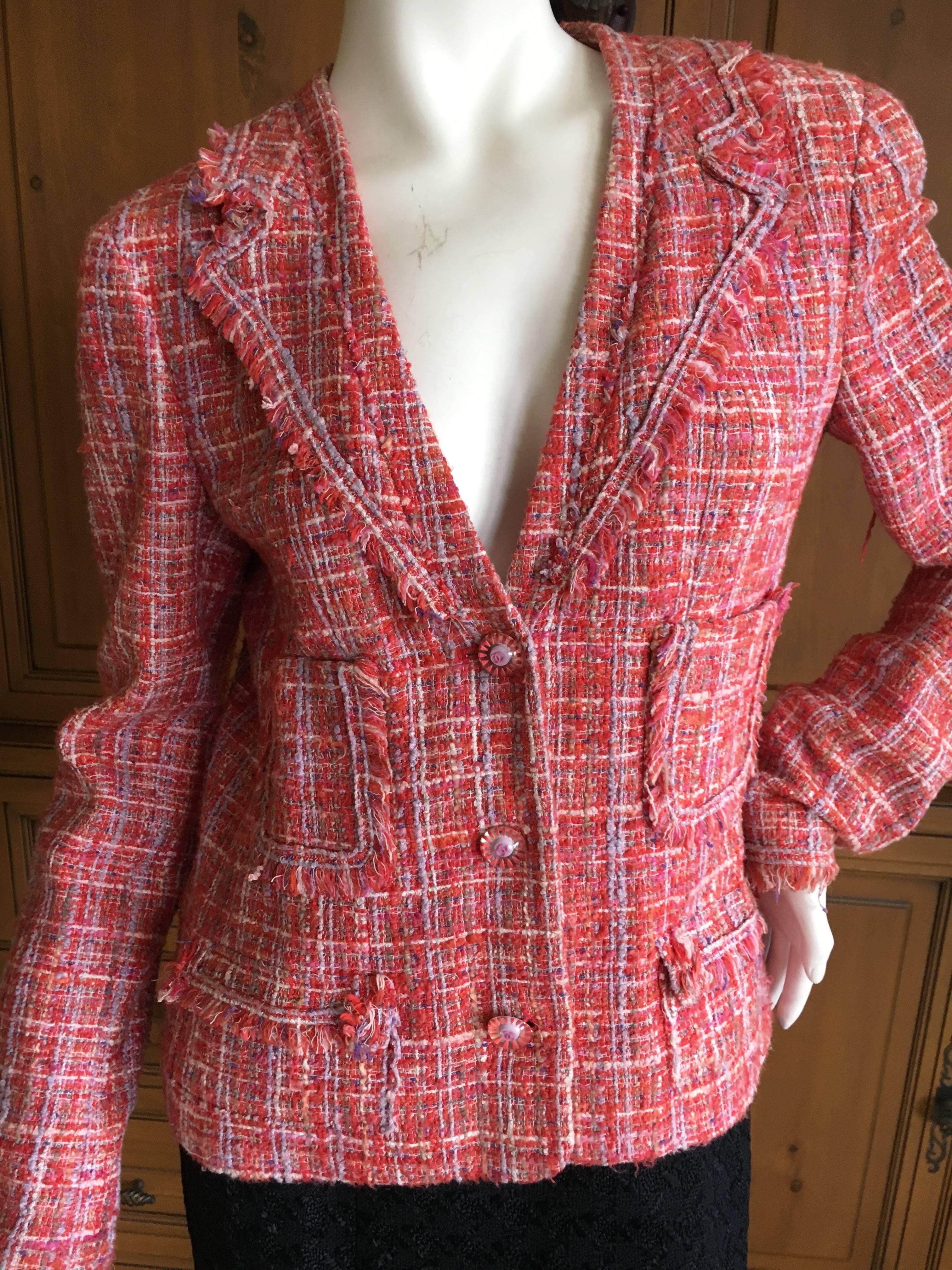 Chanel Outstanding Fantasy Tweed Fringed Jacket 

 From Spring 2004 

 Size 40 

 Bust 38" 

Waist 32" 

Length 25"  

Excellent condition