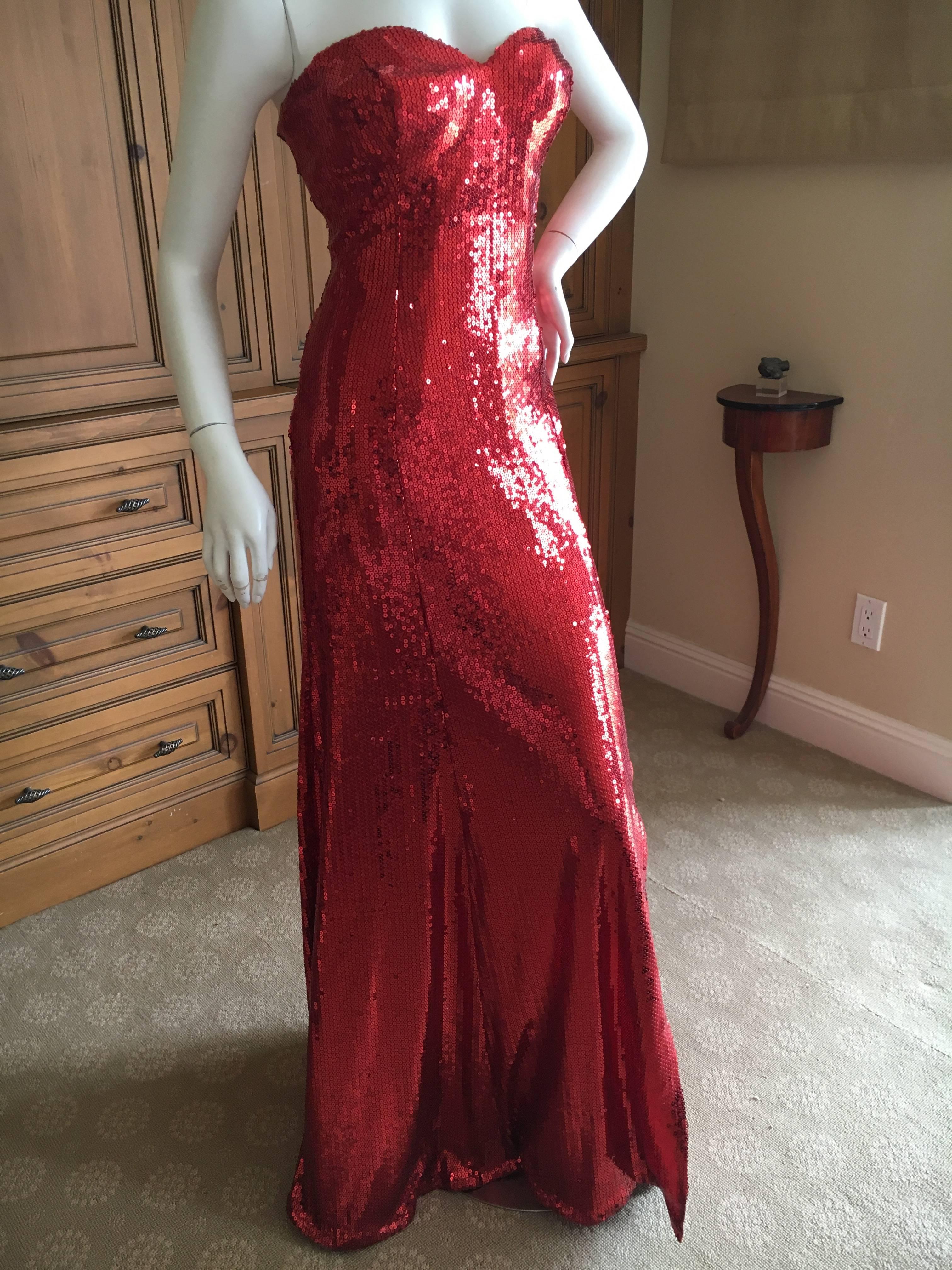 Yves Saint Laurent 70's Rive Gauche Amazing Red Sequin Strapless Evening Dress

Ce n'est pas fortement structuré:: il n'y a pas d'os ou de corset

C'est tout simplement divin:: doublé en soie. 

Il n'y a pas d'étiquette de taille:: il s'agit d'une