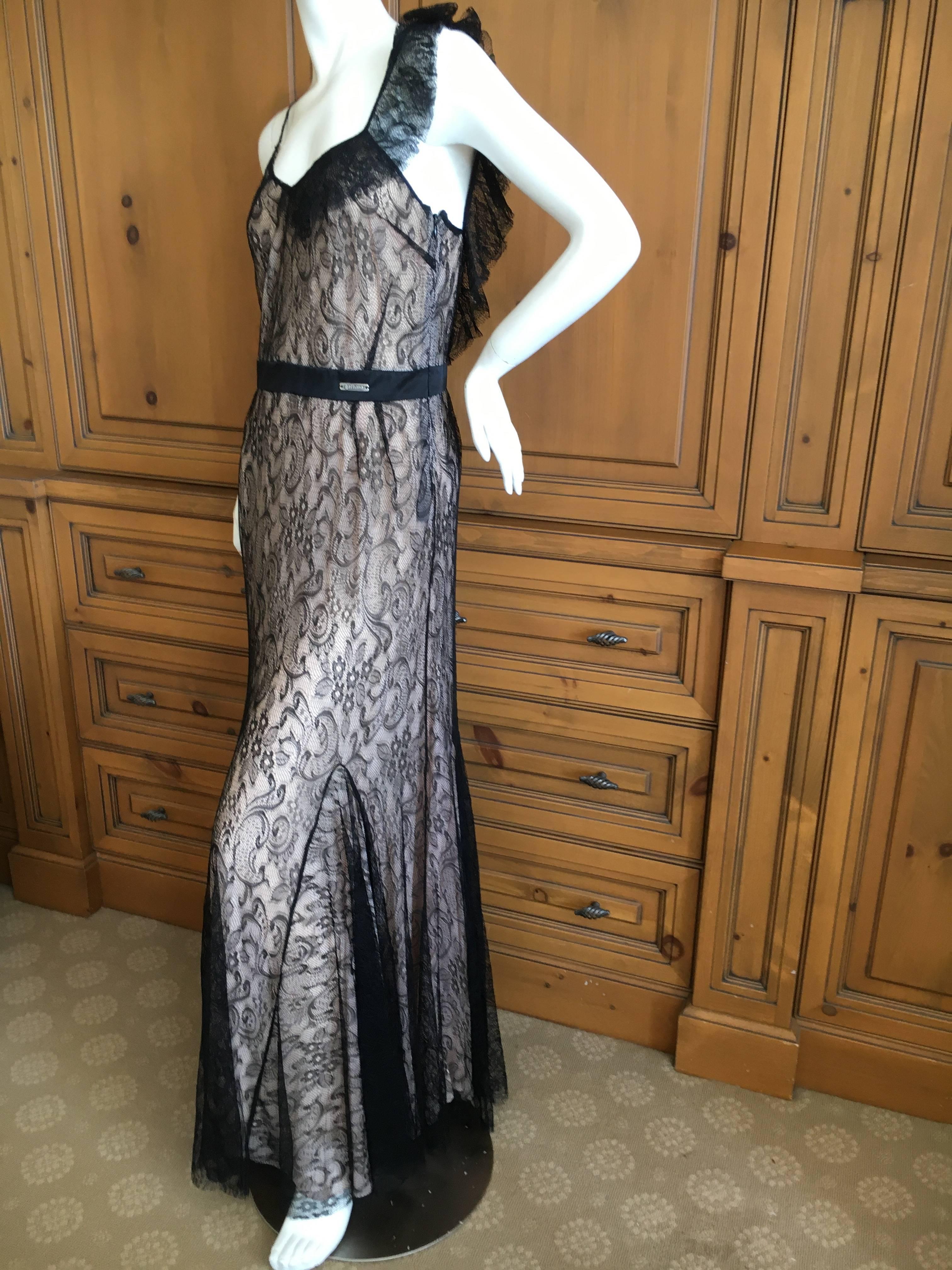 Elegant John Galliano Black Lace Evening Dress with Pale Pink Under Lining.
Size 42
Bust 38"
Waist 28"
Hips 42"
Length 60"
Excellent condition