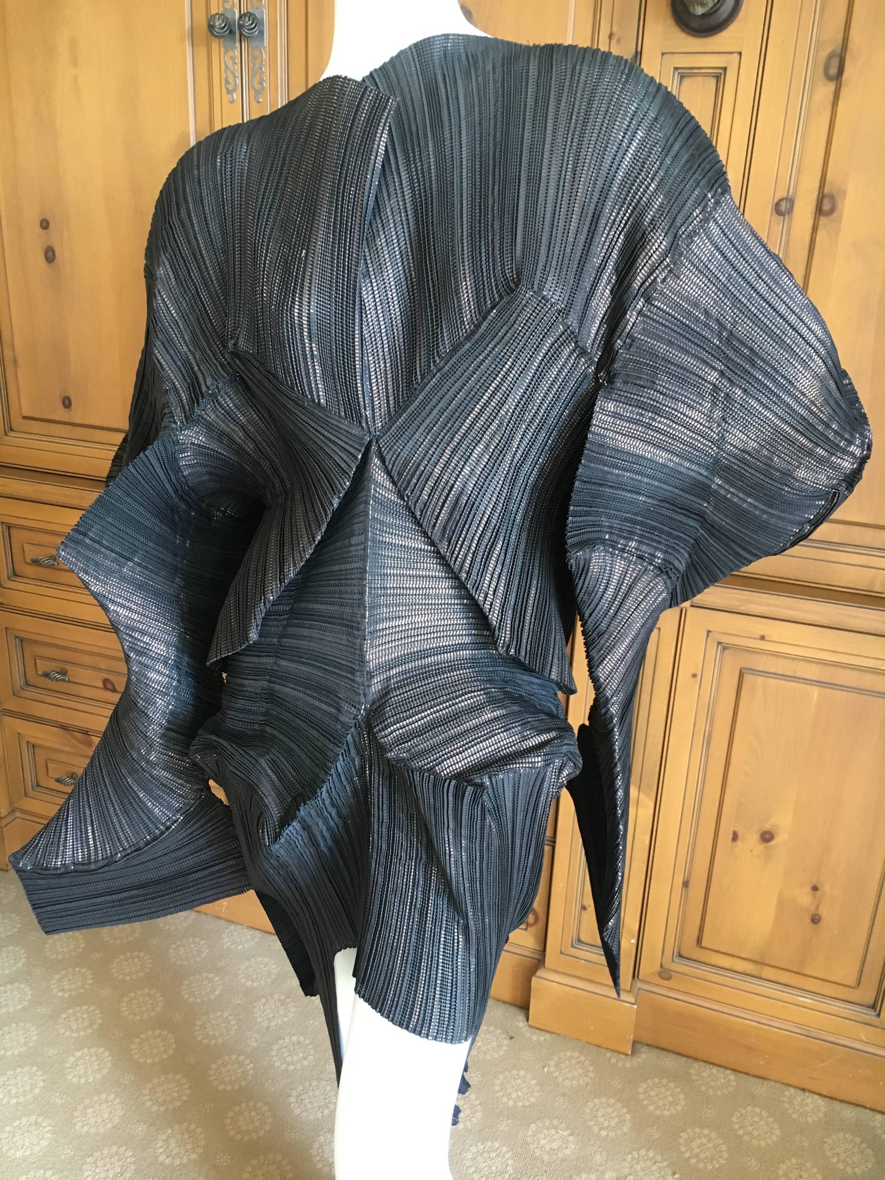 Issey Miyake Important Museum Exhibited 1980's Sculptural Black "Escargot" Dress.
This is amazing, must be seen to be appreciated. 
Last photo shows this dress at a Museum exhibition, the dress is titled "Escargot".
One size fits