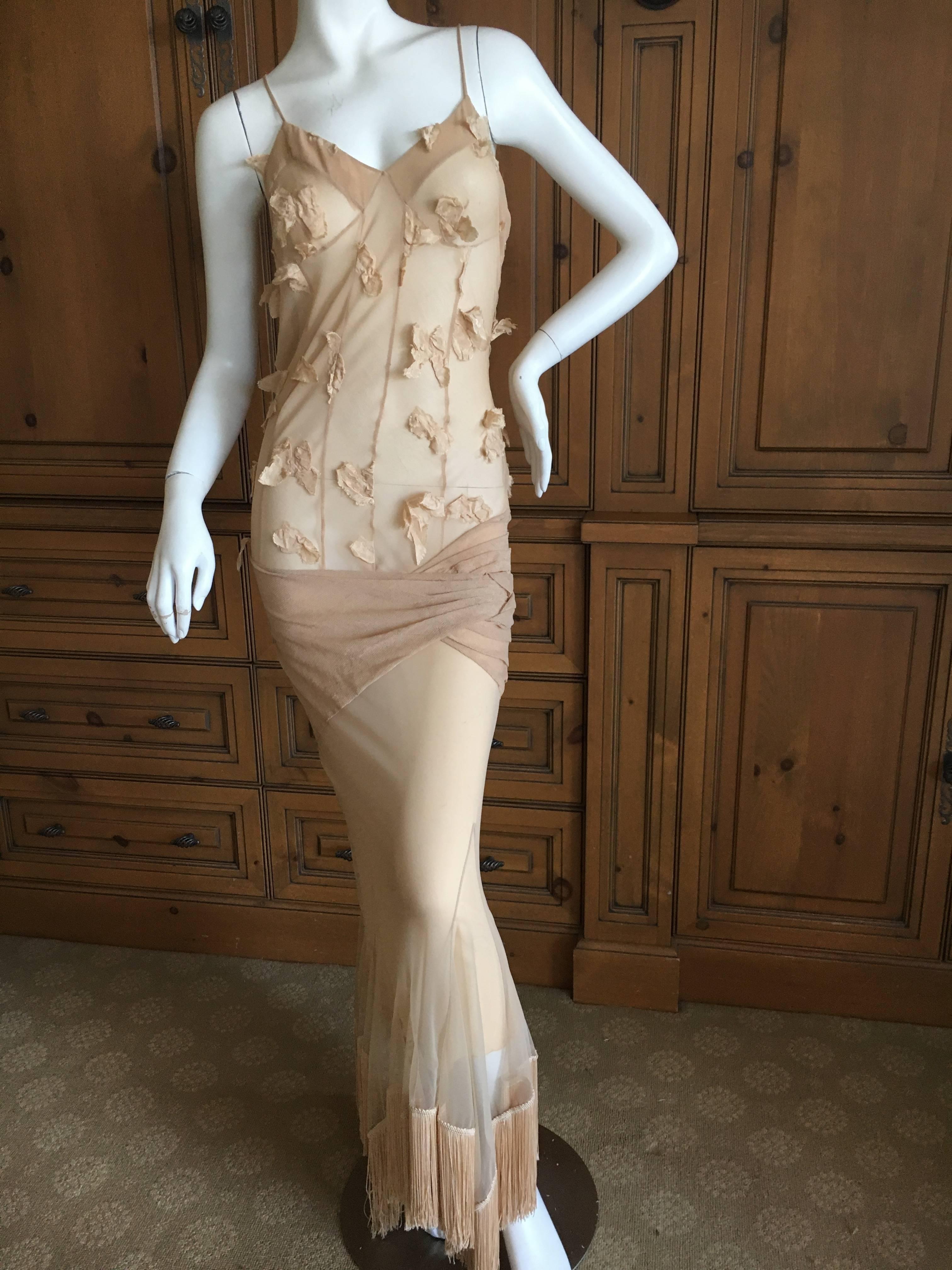 Christian Dior by John Galliano Sexy Sheer Nude Dress with Piano Finge Hem

Size  38

 Bust 38"

 Waist 30"

 Hips 38"

Length 60"

Excellent condition 