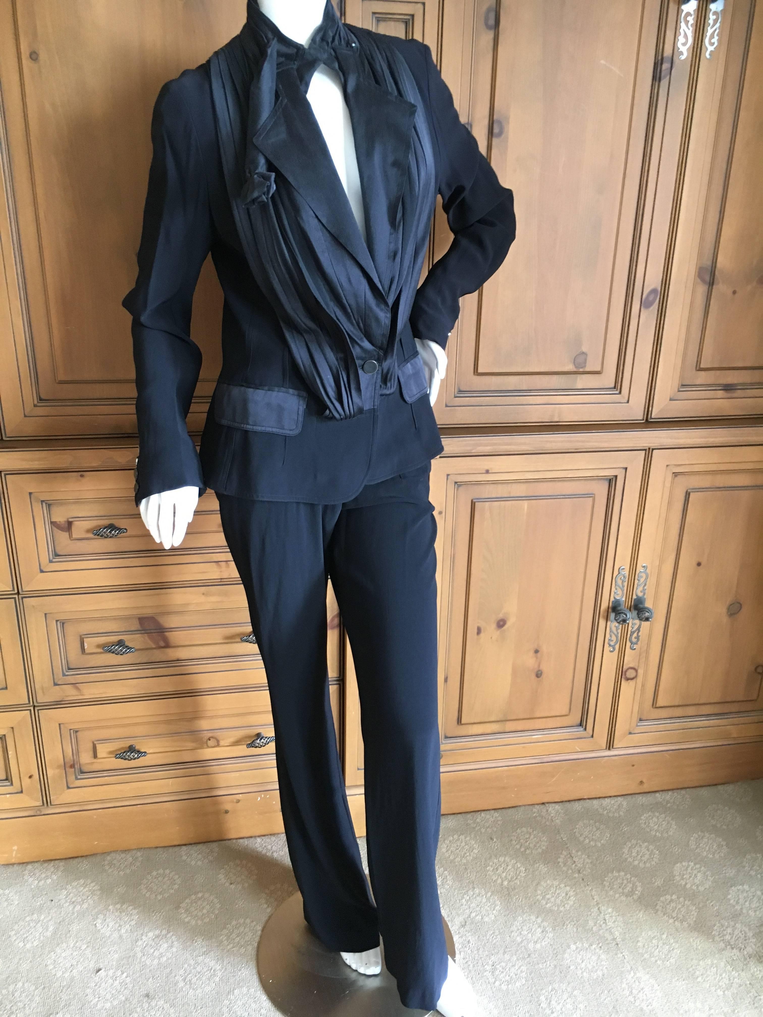 John Galliano 1990's Black Tuxedo
Featuring pants with contrasting tuxedo stripe and jacket.
Size 42
Bust 40