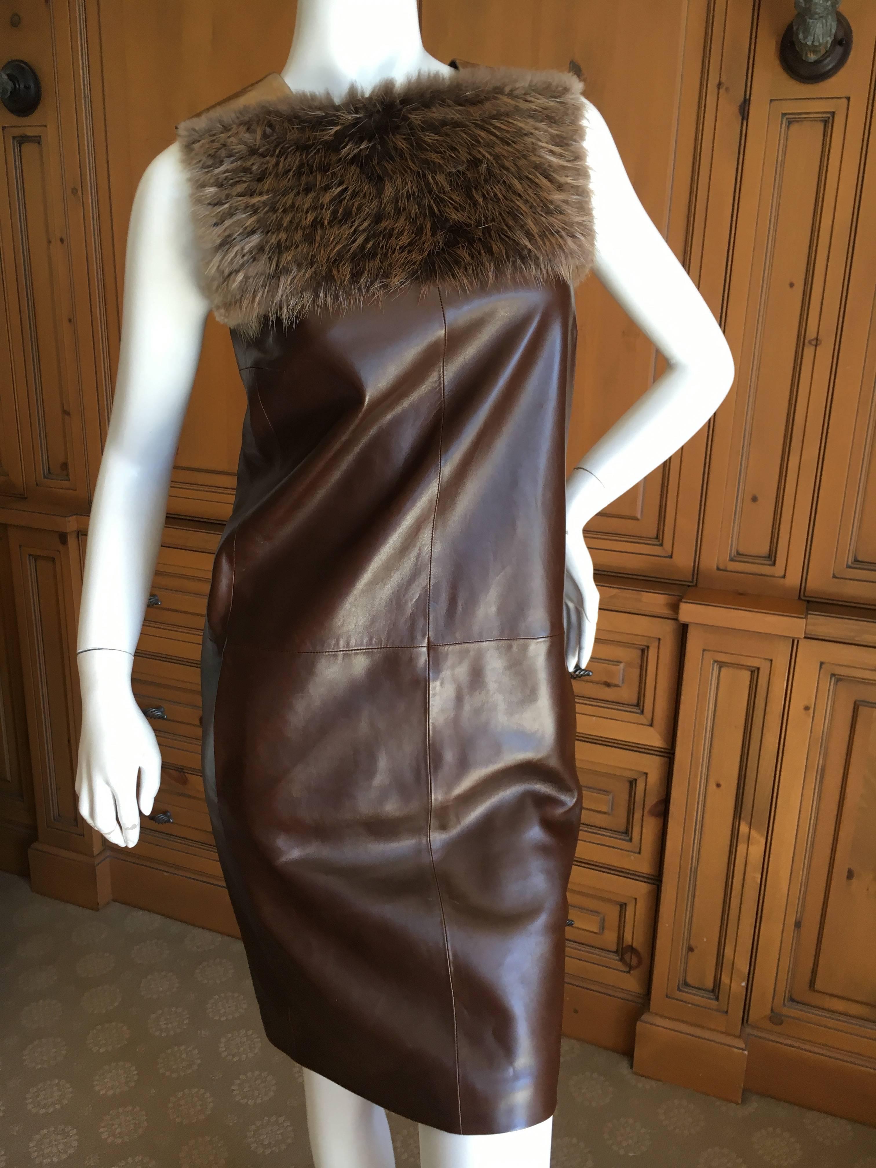 Gucci Brown and Gold Leather Sleeveless Shift Dress with Fur Trim.
Size 38
Bust 36