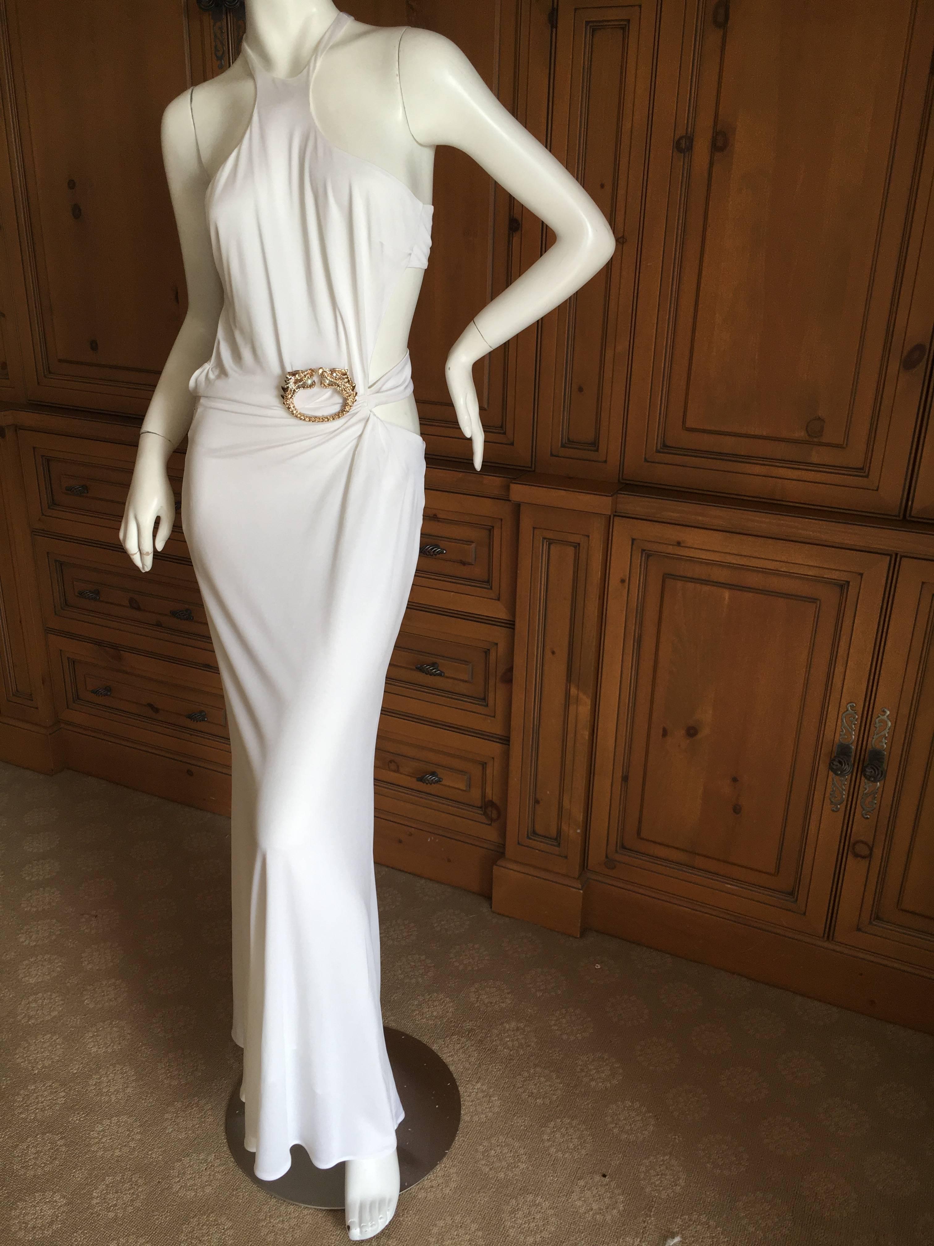 Iconic white halter evening dress with jeweled dragon from Gucci by Tom Ford 2004.
 As featured on Daria in the Gucci Ad.
 For the serious Tom Ford collector.
 French size 34-36, the size and fabric tag is no longer attached.
There is a lot of