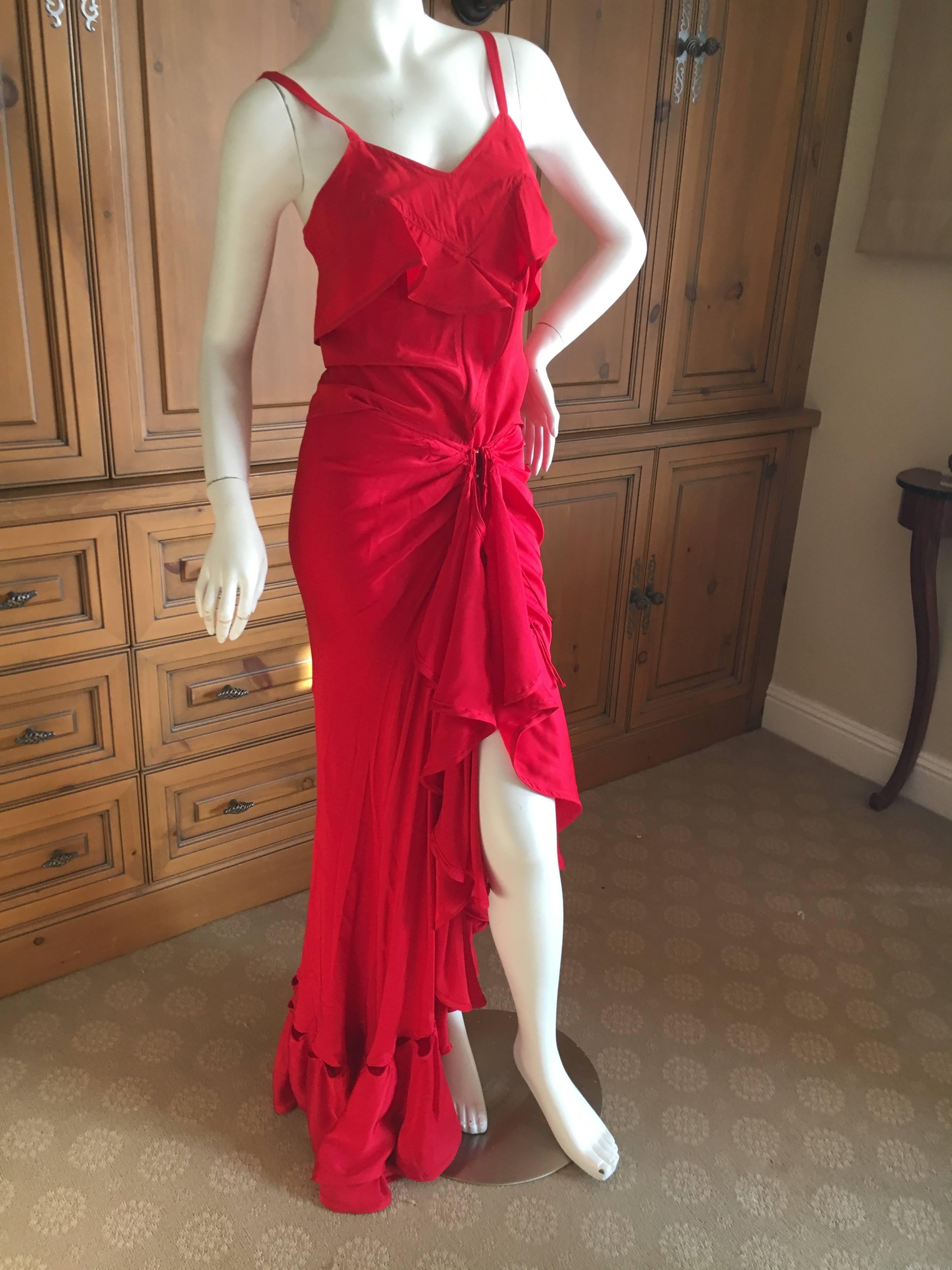 Romantic Yves Saint Laurent by Tom Ford Fall 2003 Red Two Piece Evening Dress.
Flamenco style skirt with ruffles and tank top.
Size 44, Runs small
Skirt;
Waist 26"
Hips 42"
Length 23"
Top;
Bust 36"
Waist 25
Length 23