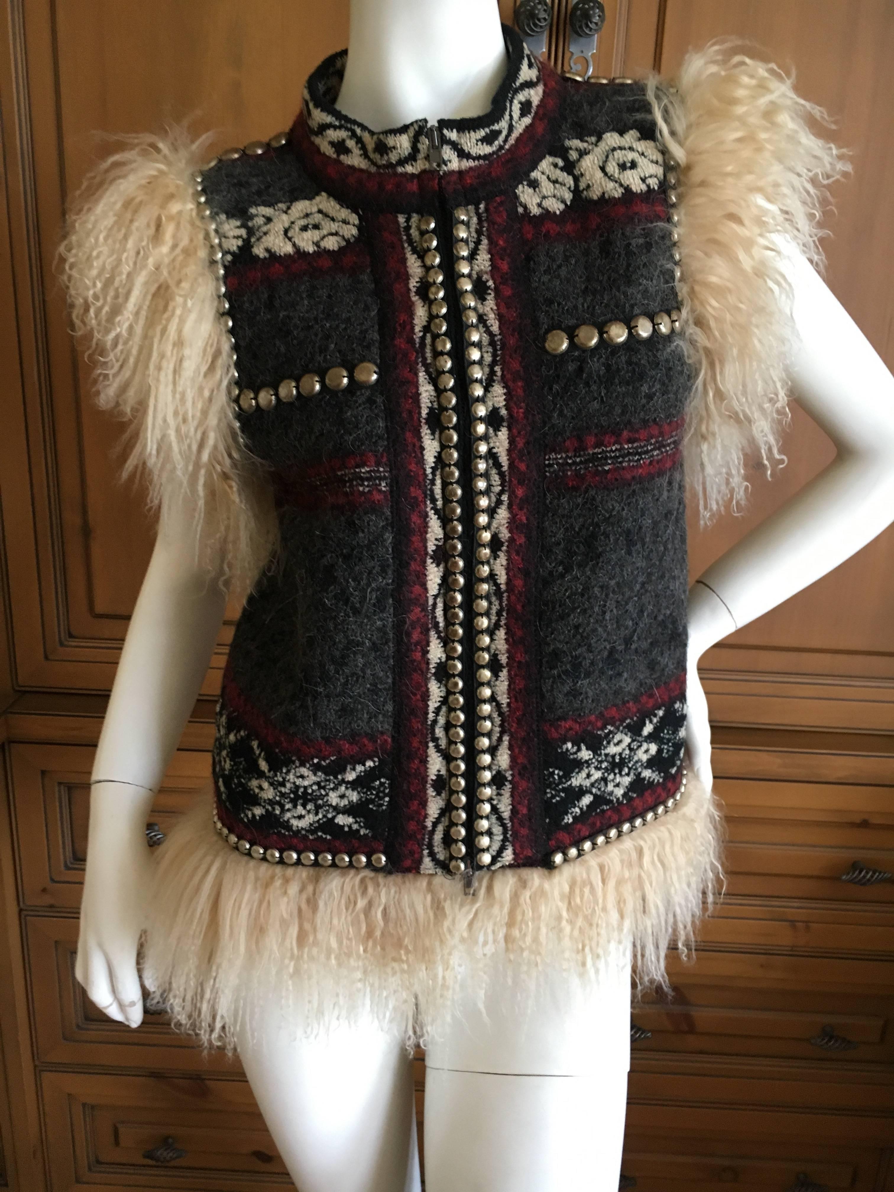 Terrific Vintage Jean Paul Gaultier Maille Femme Studded Boho Ethnic Vest with Curly Lamb Trim.
Size small but seems to run large
Bust 36