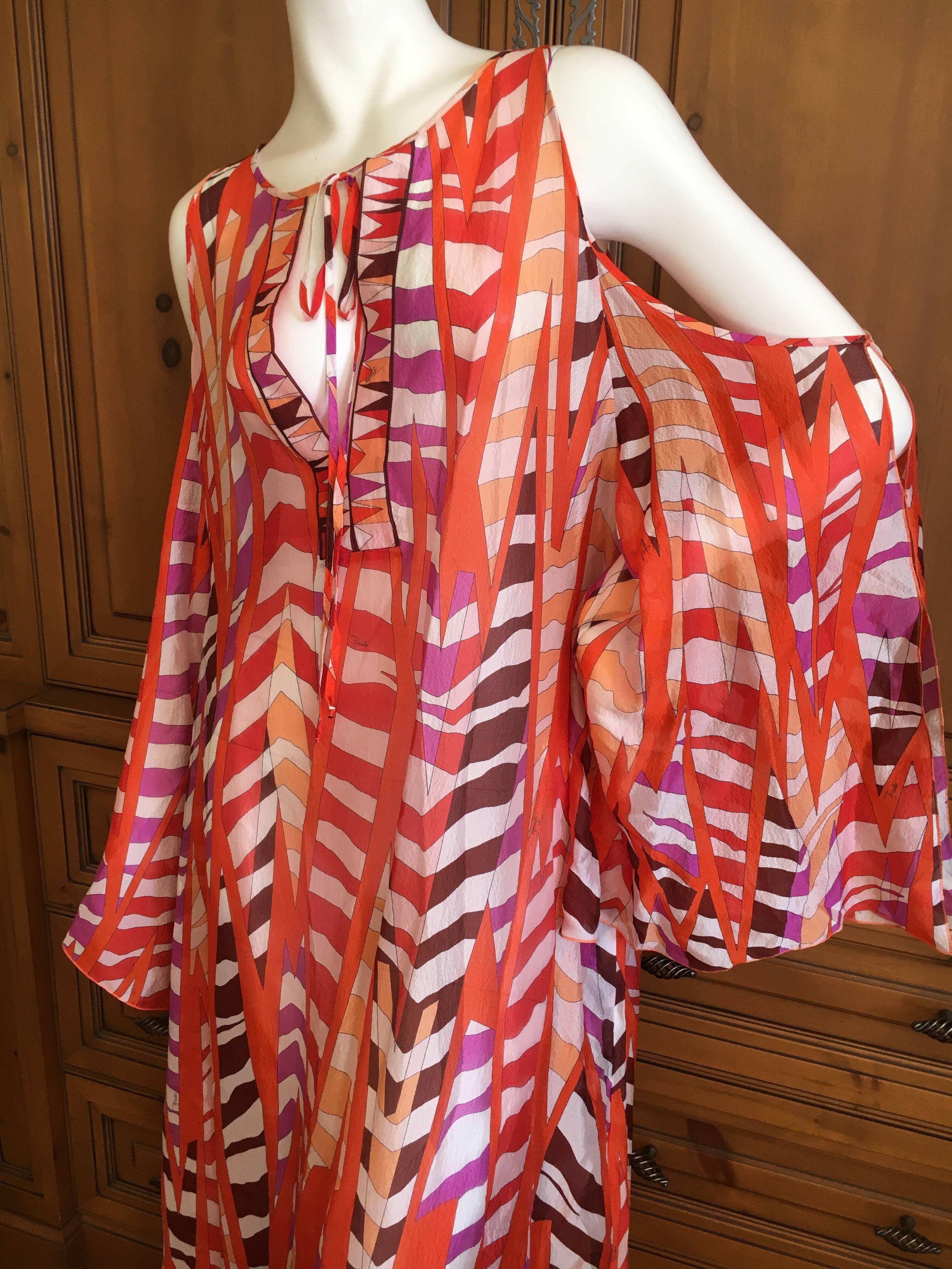 Emilio Pucci Sheer Patterned Caftan with Cold Shoulder cut outs.
 New with Tags.
Exquisite sheer silk cotton blend patterned caftan from Emilio Pucci.
Brand New , unworn with tags.
Perfect for Pool or Beach cover up.
Marked size 40, seems to run