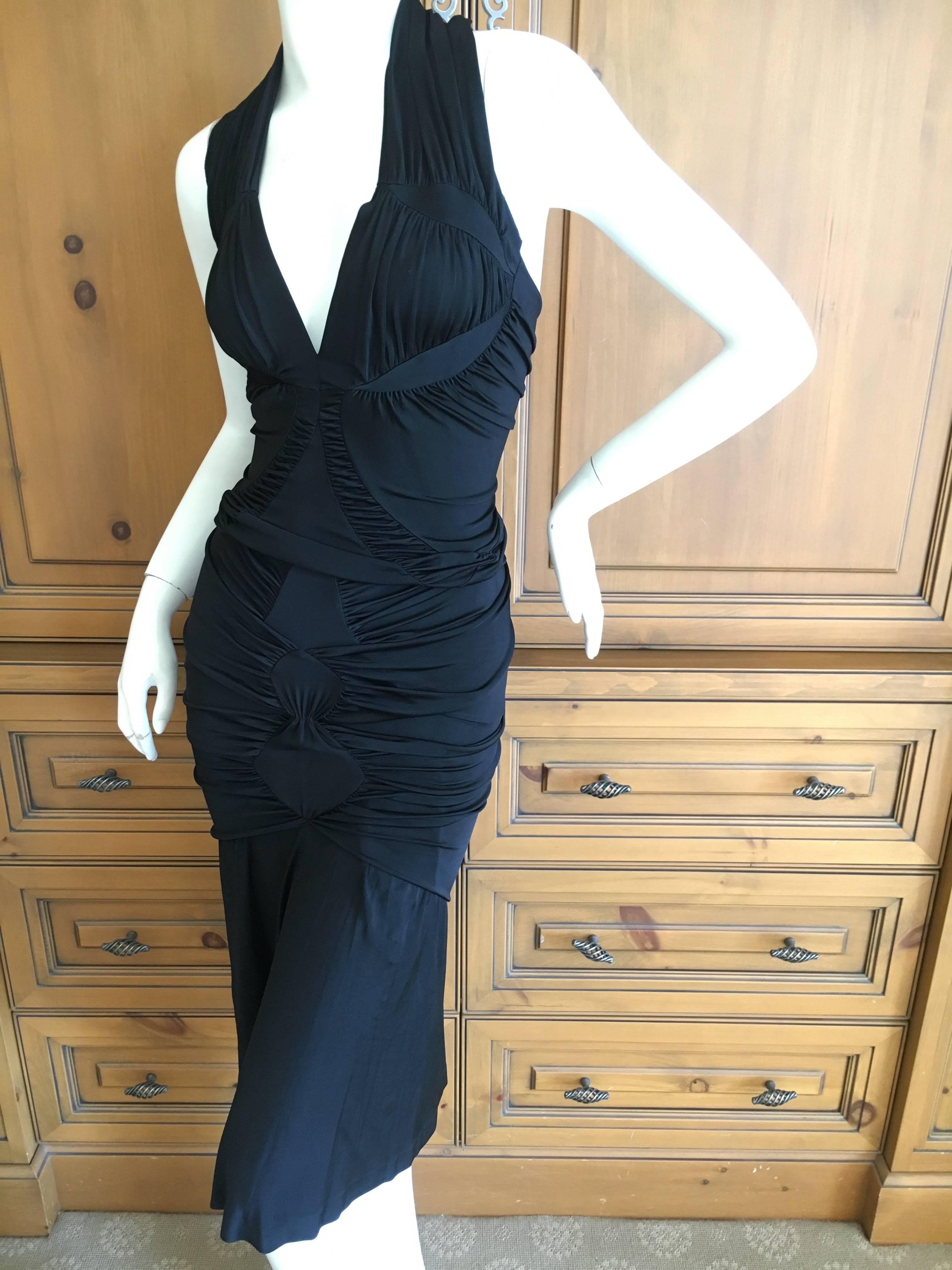 Yves Saint Laurent by Tom Ford Black Two Piece Cocktail Dress.
Skirt and top in black.
Size Small
Bust 34"
Waist 25"
Hip 38"
